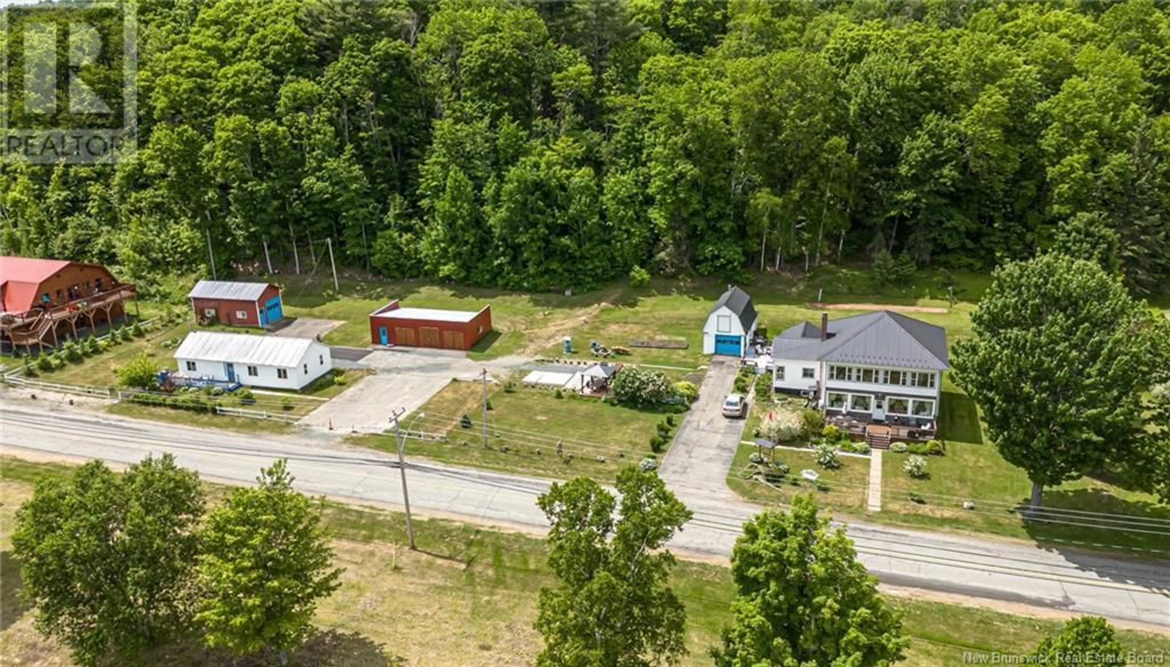 A pic from outside/outdoor area/front of a property/back of a property/a pic from drone, unknown for 519-531 OTIS DRIVE, Nackawic New Brunswick E6G1H6