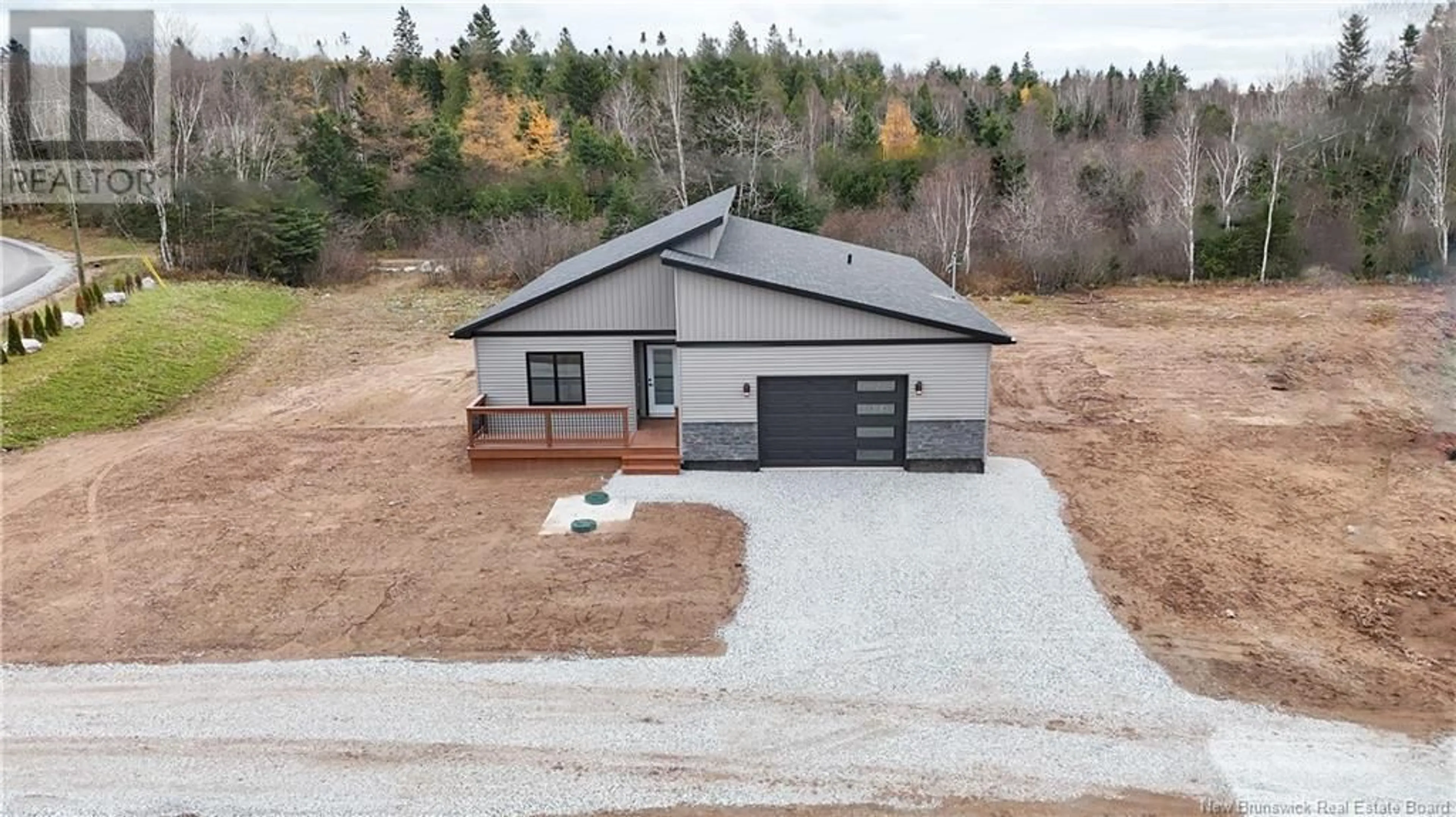 A pic from outside/outdoor area/front of a property/back of a property/a pic from drone, building for 7 Bellbottom Way, Quispamsis New Brunswick E2G2B8