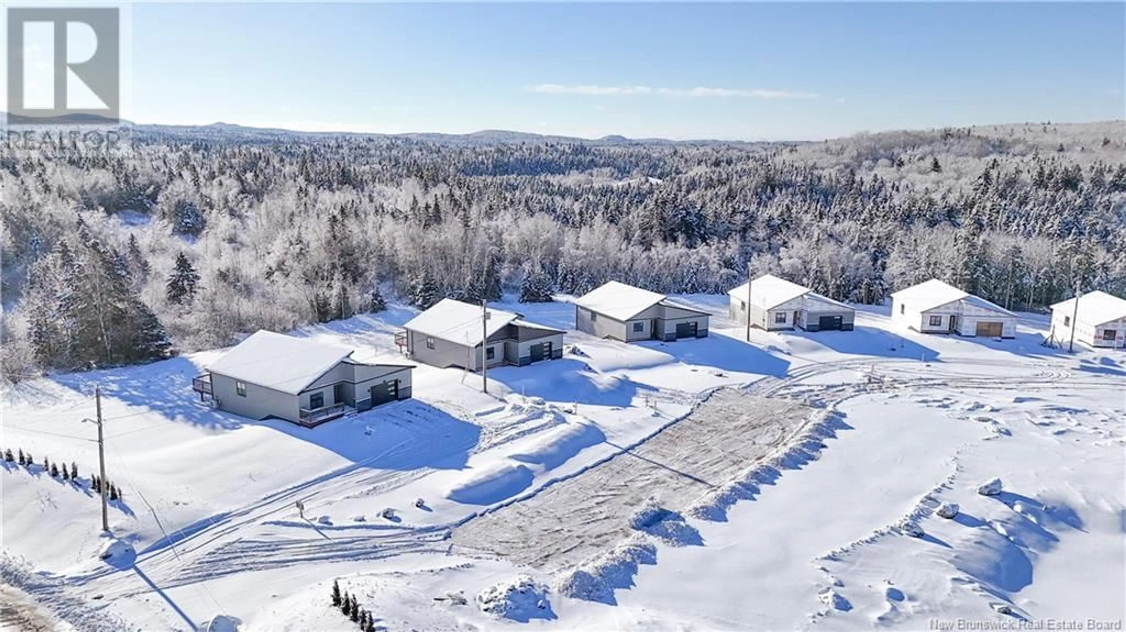 A pic from outside/outdoor area/front of a property/back of a property/a pic from drone, unknown for 7 Bellbottom Way, Quispamsis New Brunswick E2G2B8