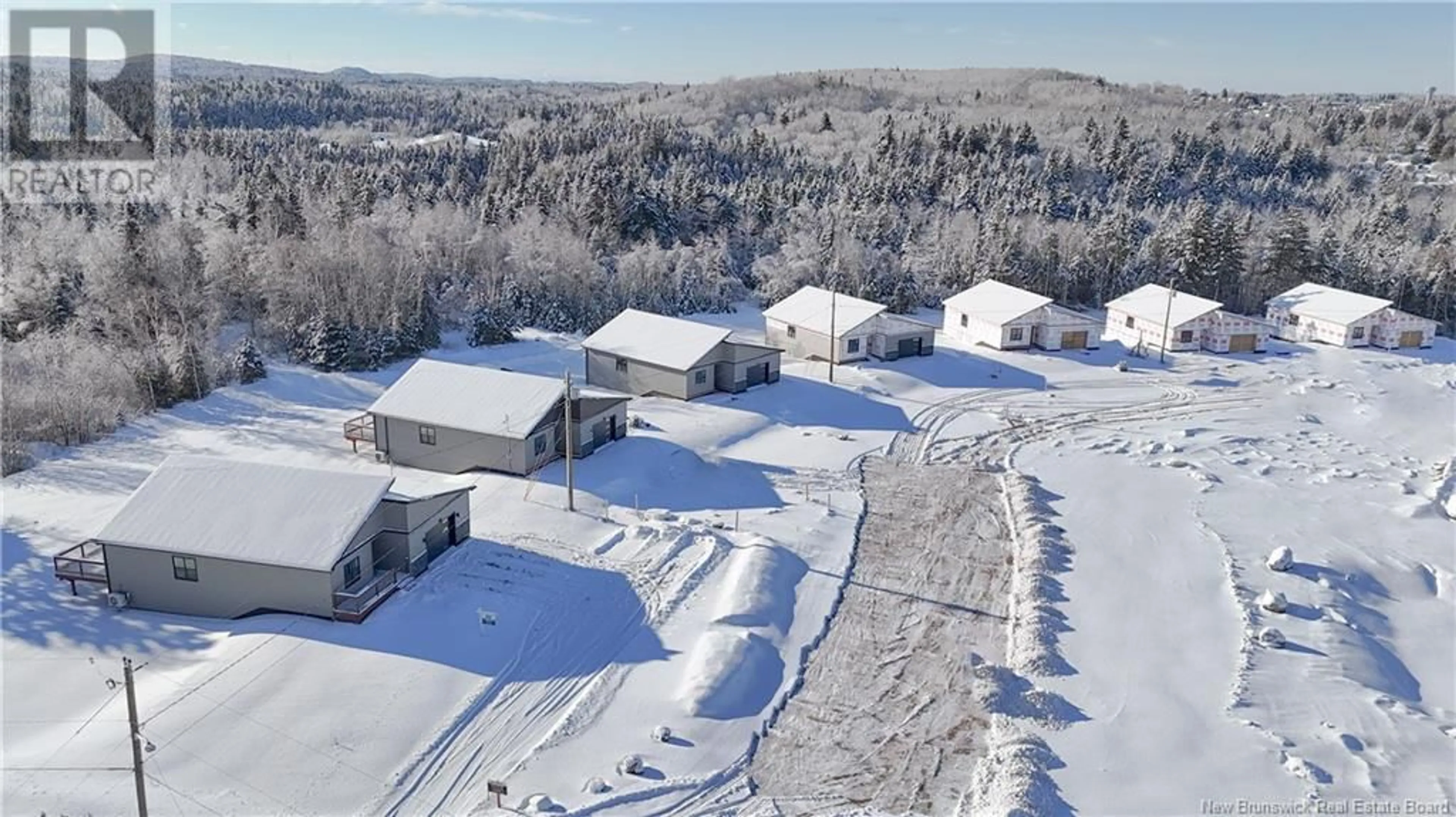 A pic from outside/outdoor area/front of a property/back of a property/a pic from drone, unknown for 7 Bellbottom Way, Quispamsis New Brunswick E2G2B8