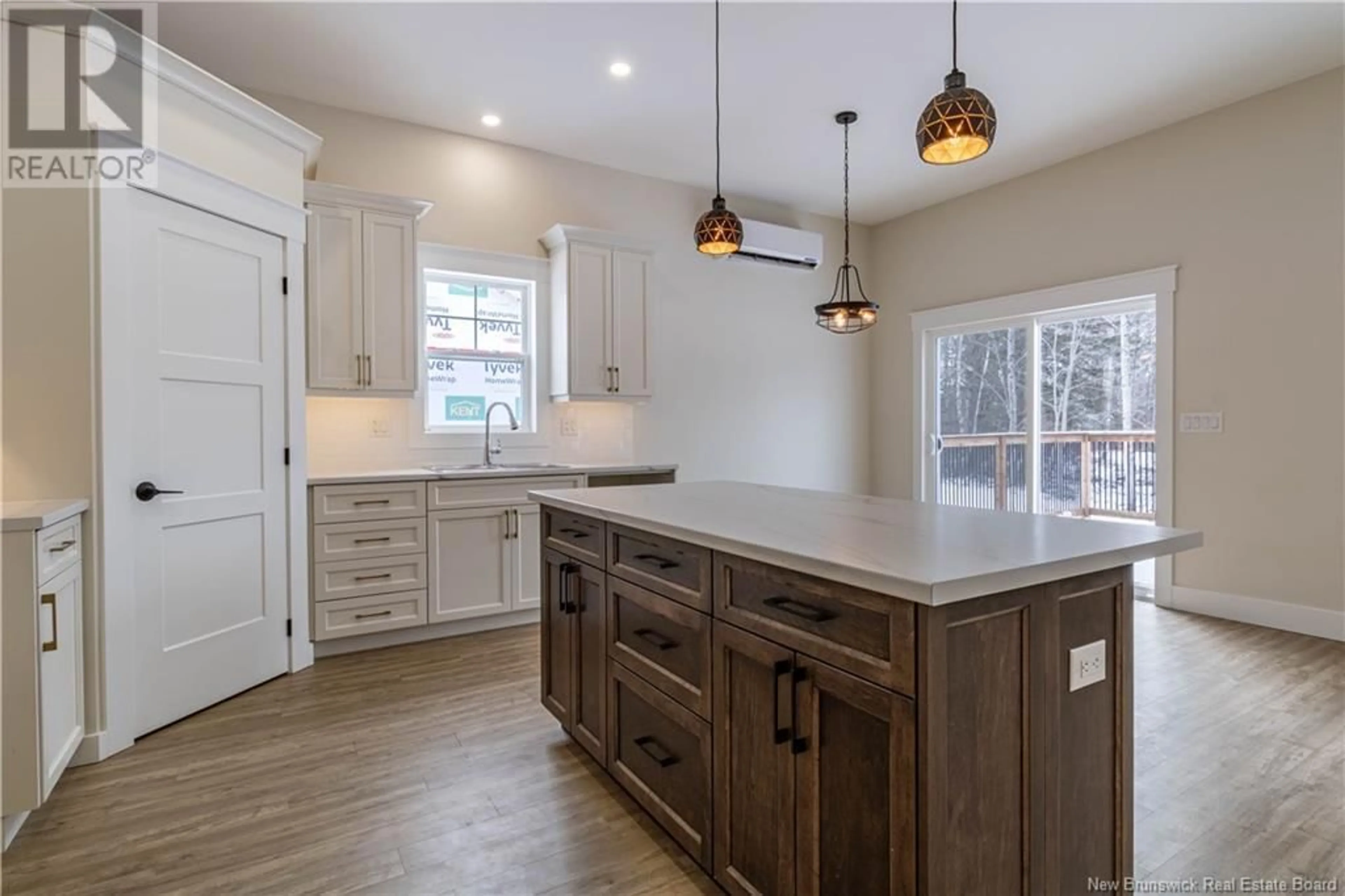 Open concept kitchen, wood/laminate floor for 11 HOOD STREET, Petitcodiac New Brunswick E4Z4K1