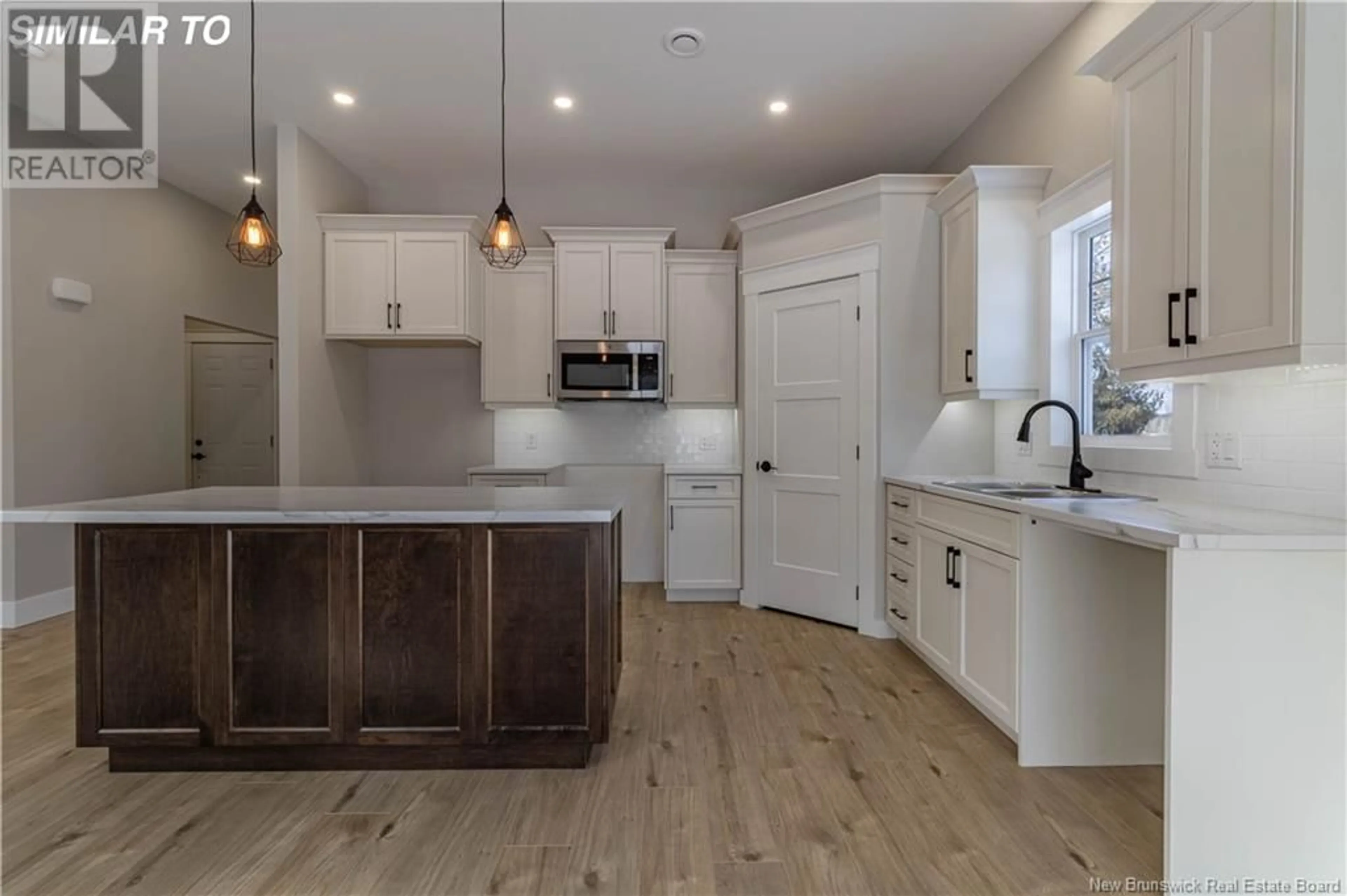 Open concept kitchen, unknown for 11 Hood Street, Petitcodiac New Brunswick E4Z4K1