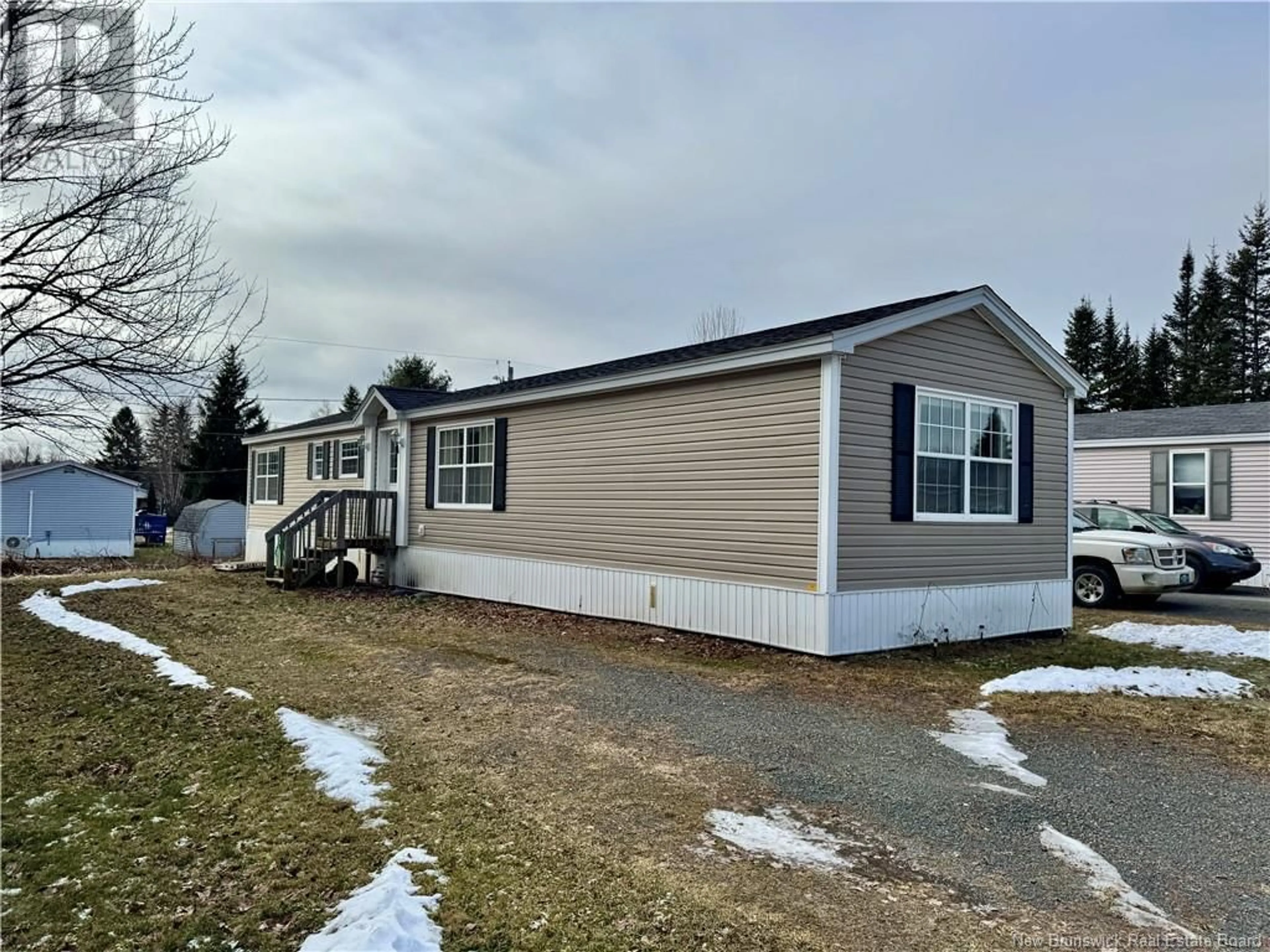 Home with vinyl exterior material, street for 33 HILL Street, Lincoln New Brunswick E3B6W1