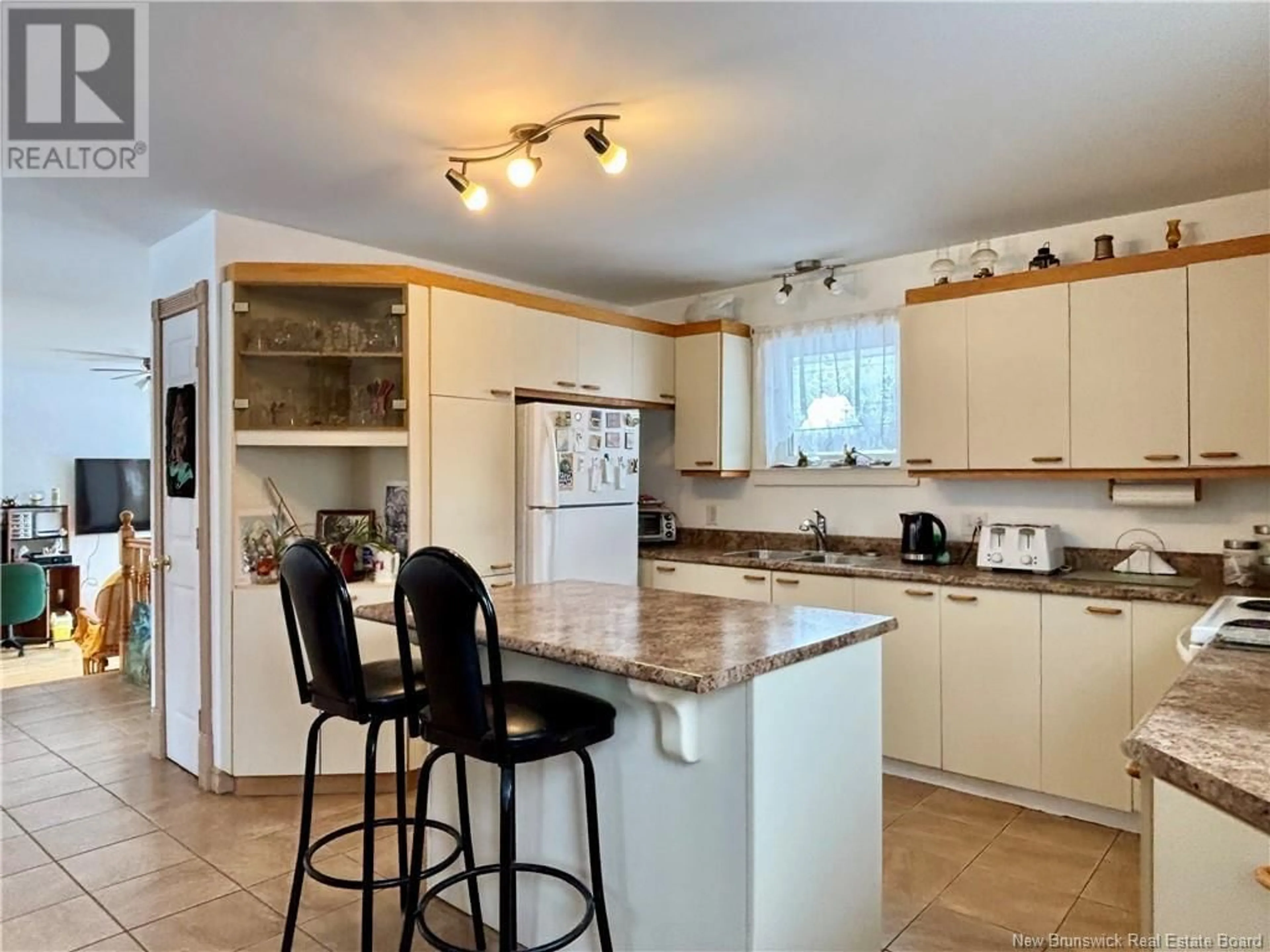 Open concept kitchen, ceramic/tile floor for 745 Rte 450, Lavillette New Brunswick E9G2R2