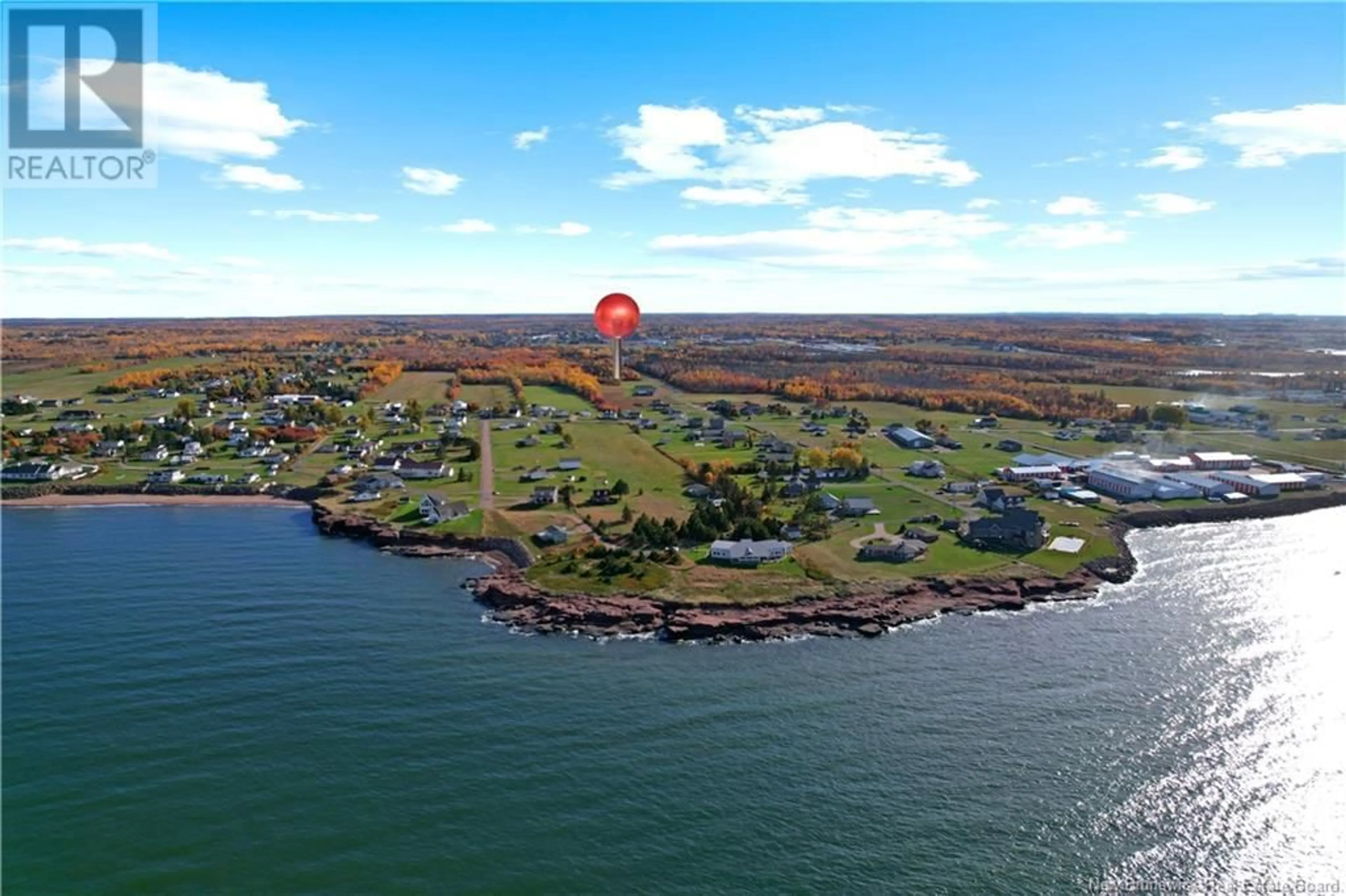 A pic from outside/outdoor area/front of a property/back of a property/a pic from drone, water/lake/river/ocean view for 54 Bedeche Street, Cap-Pelé New Brunswick E4N0G1