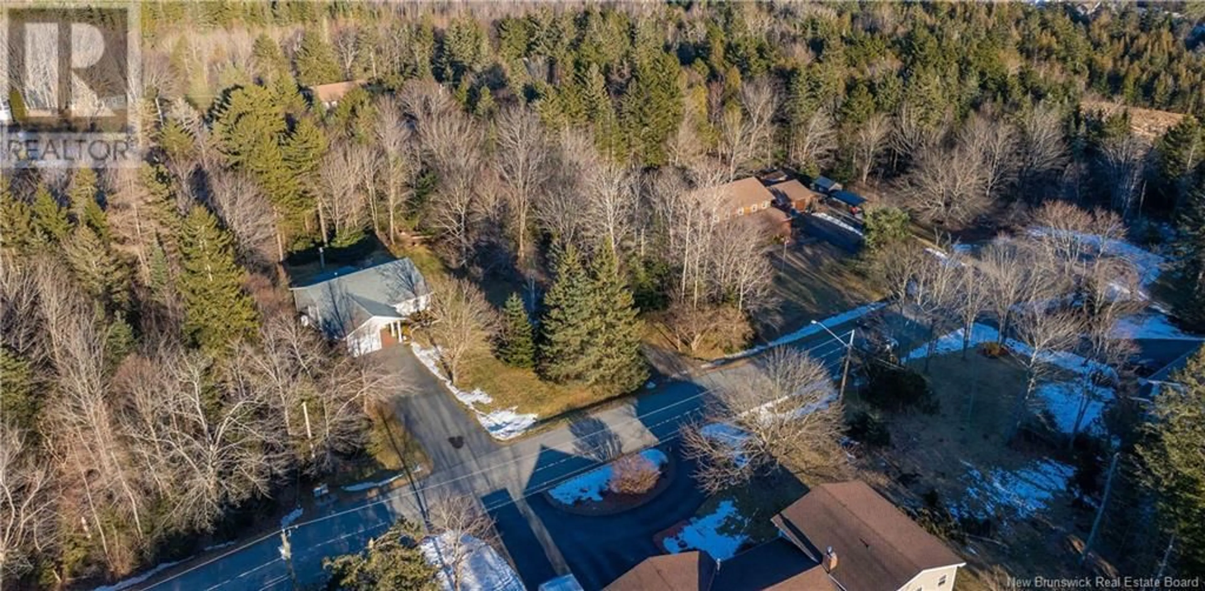 A pic from outside/outdoor area/front of a property/back of a property/a pic from drone, street for 35 School Avenue, Rothesay New Brunswick E2E1Z6