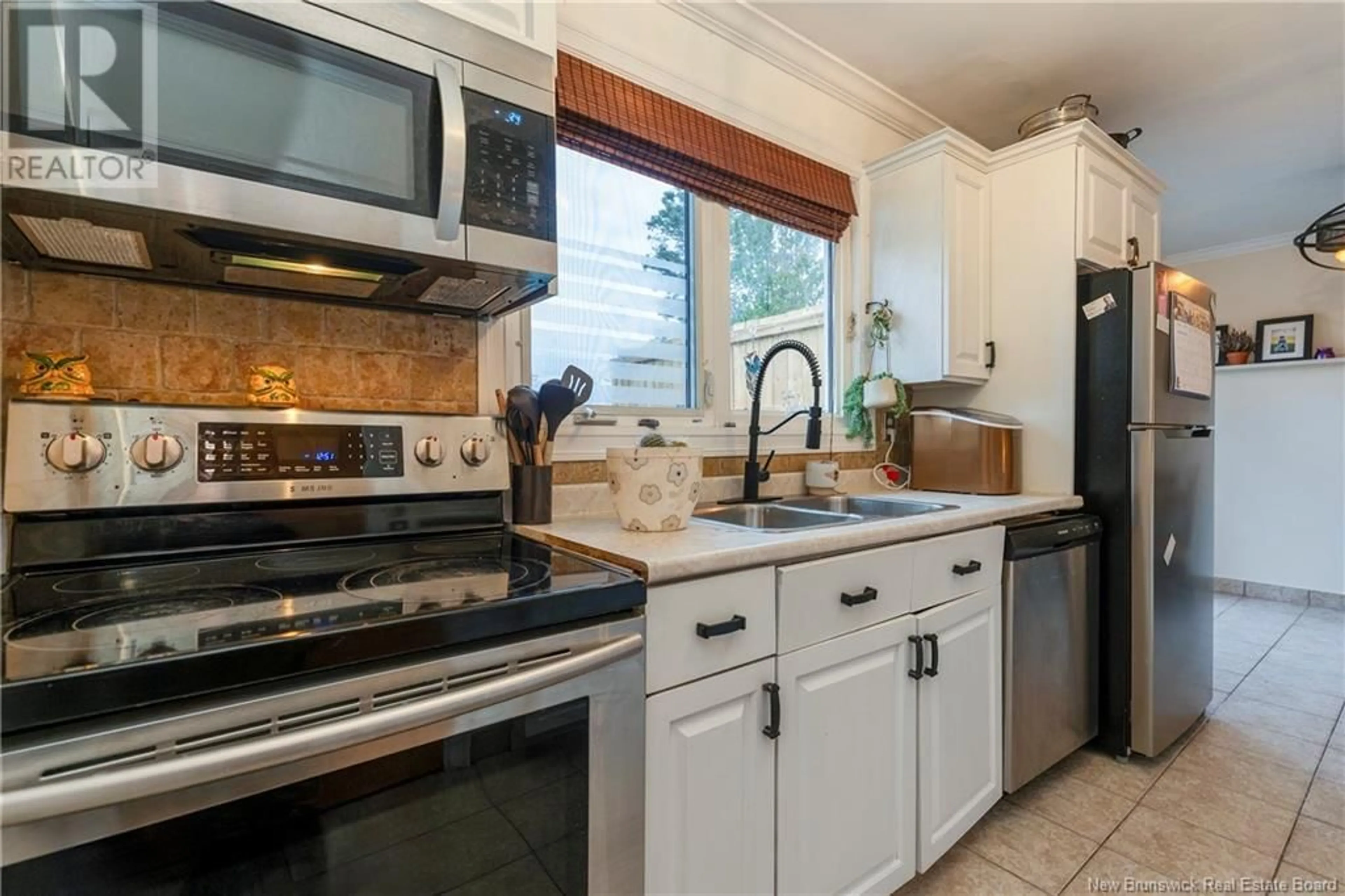 Open concept kitchen, ceramic/tile floor for 5 Drummond, Saint John New Brunswick E2M2T4