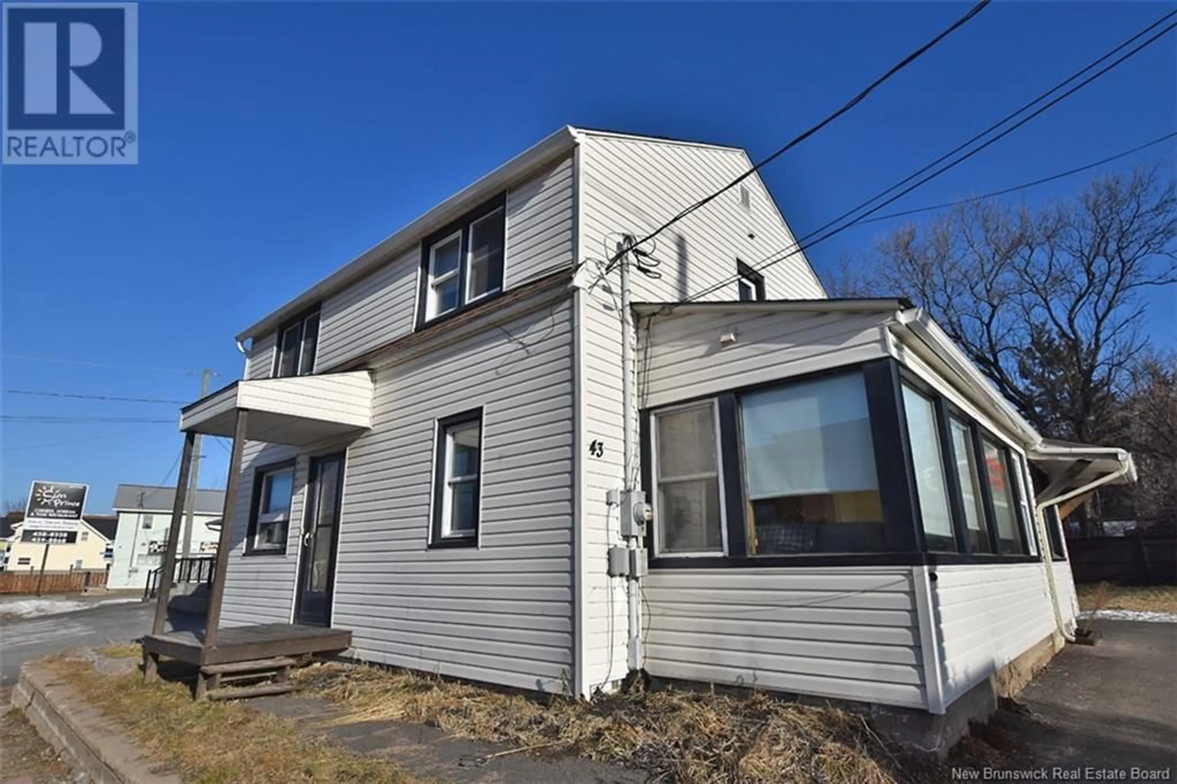 Home with vinyl exterior material, building for 43 Main Street, Fredericton New Brunswick E3A1B9