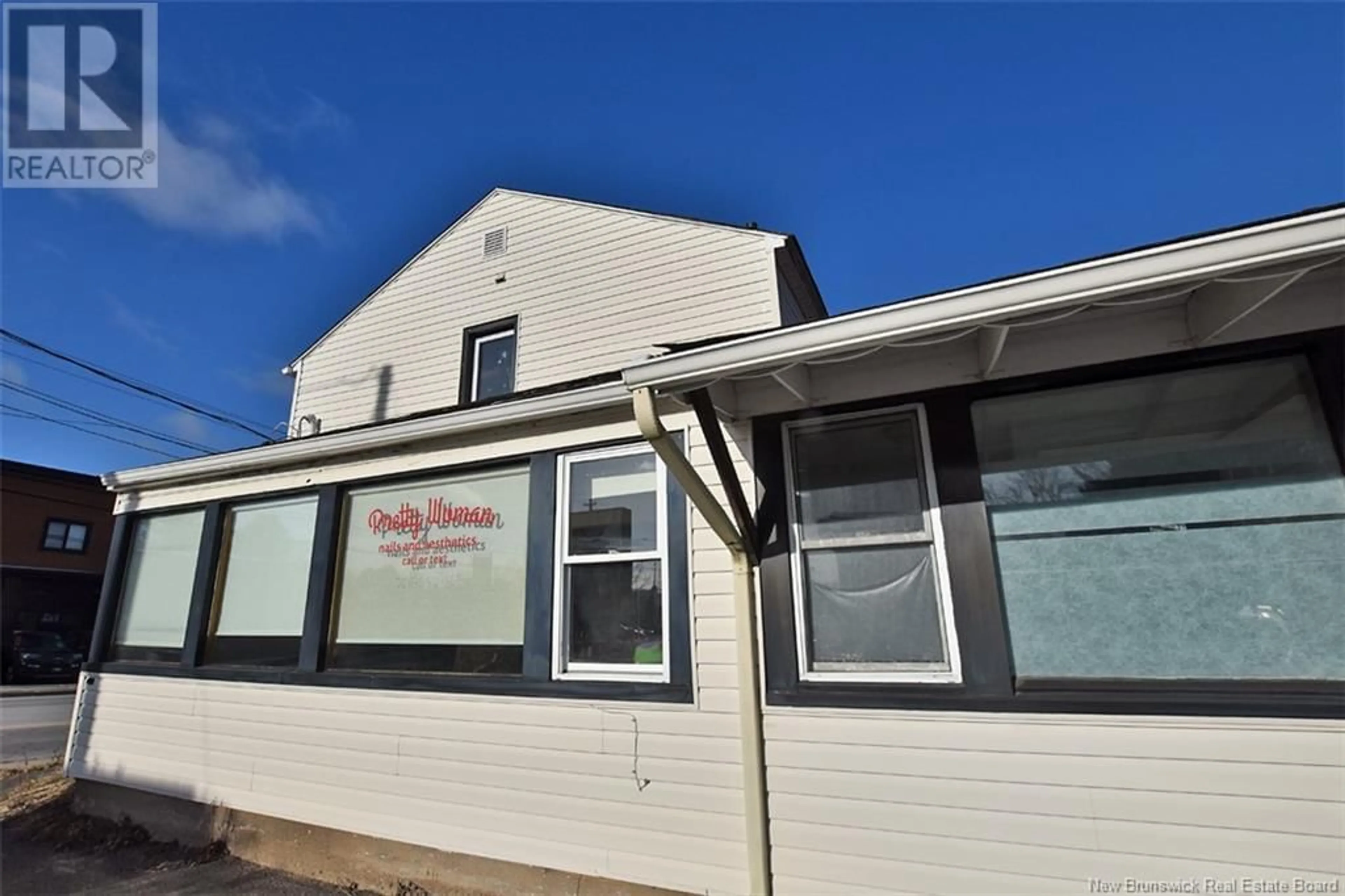 Home with vinyl exterior material, building for 43 Main Street, Fredericton New Brunswick E3A1B9