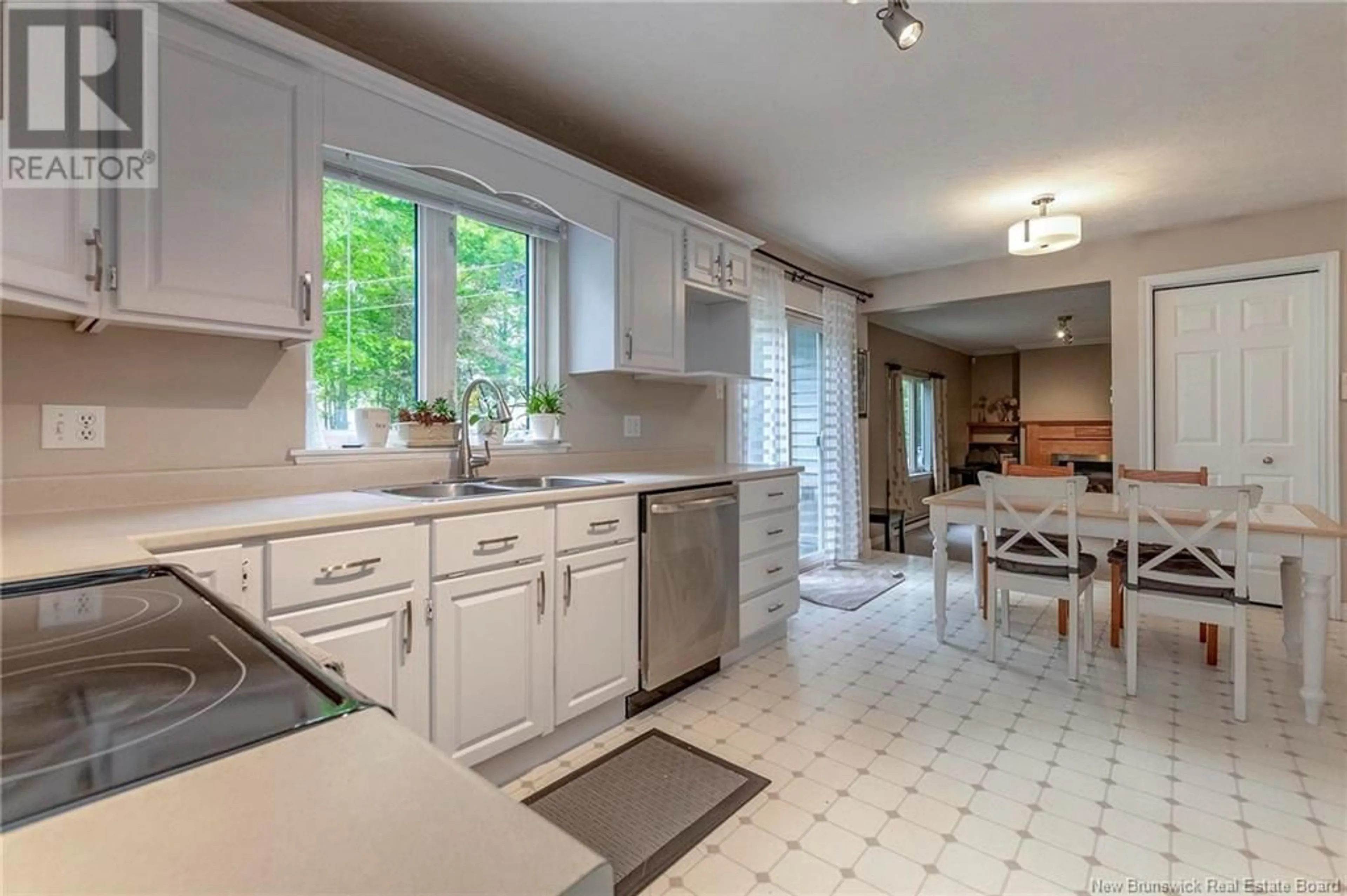 Open concept kitchen, ceramic/tile floor for 158 Elmhurst Road, Moncton New Brunswick E1C9V4