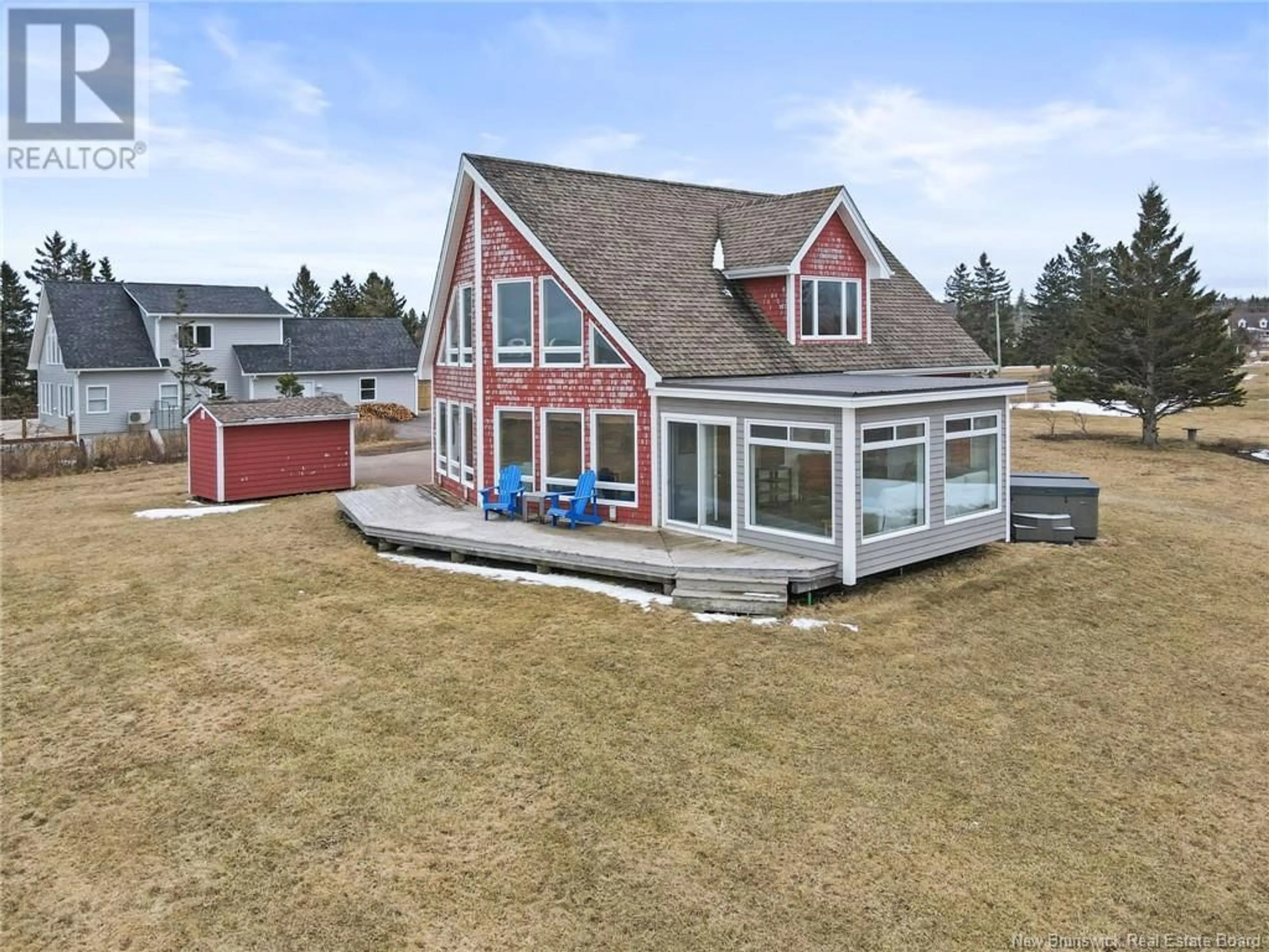 A pic from outside/outdoor area/front of a property/back of a property/a pic from drone, water/lake/river/ocean view for 23 Power Street, Grande-Digue New Brunswick E4R5W2