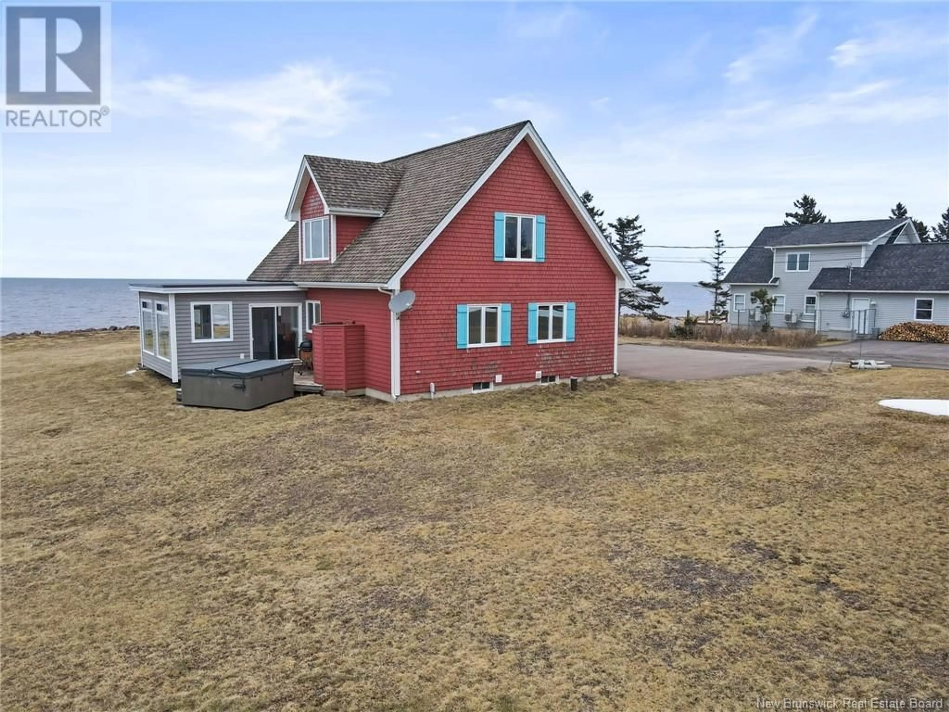 A pic from outside/outdoor area/front of a property/back of a property/a pic from drone, water/lake/river/ocean view for 23 Power Street, Grande-Digue New Brunswick E4R5W2