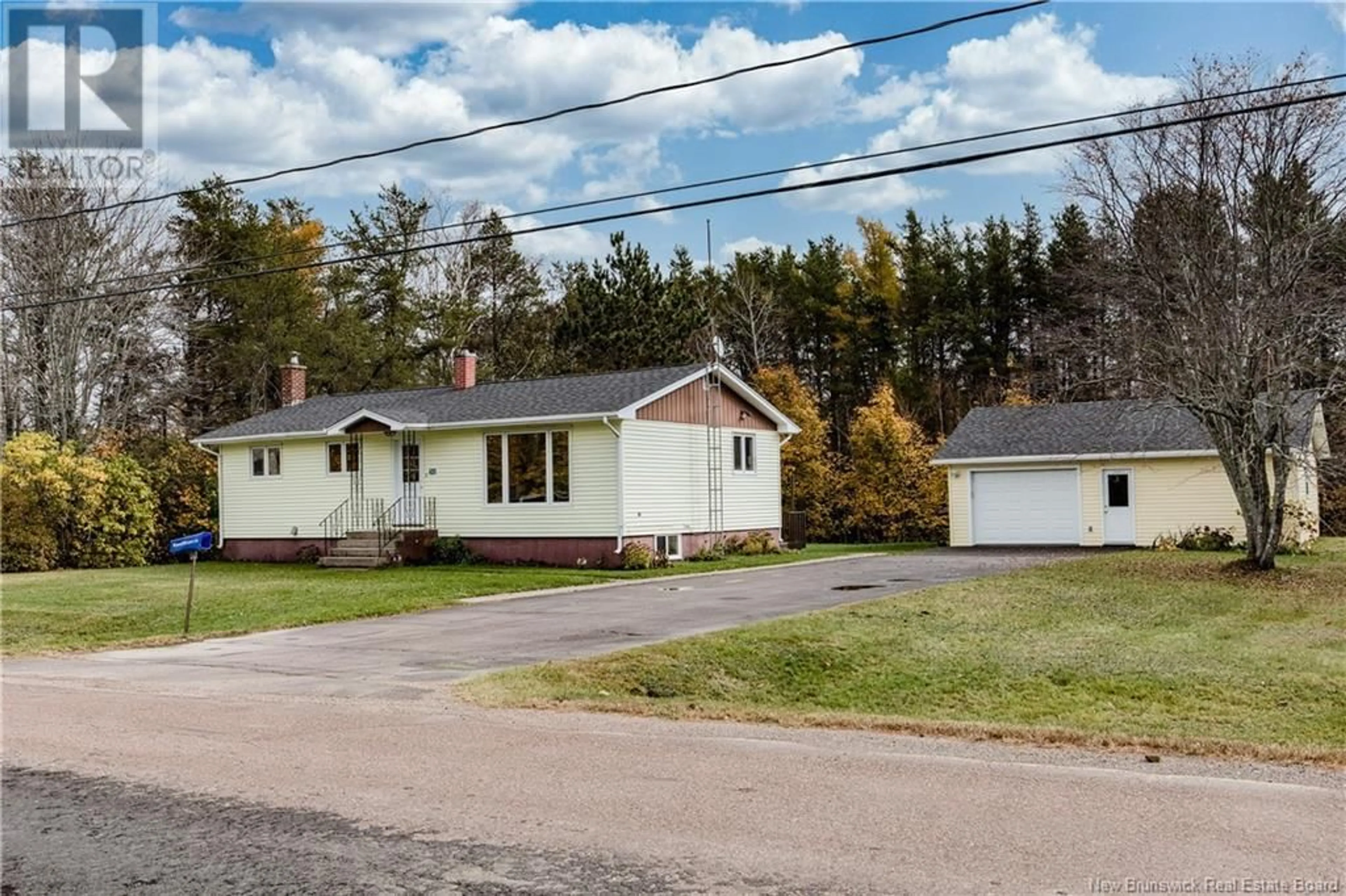 A pic from outside/outdoor area/front of a property/back of a property/a pic from drone, street for 50 Pointe de l'Eglise, Aldouane New Brunswick E4W5H2