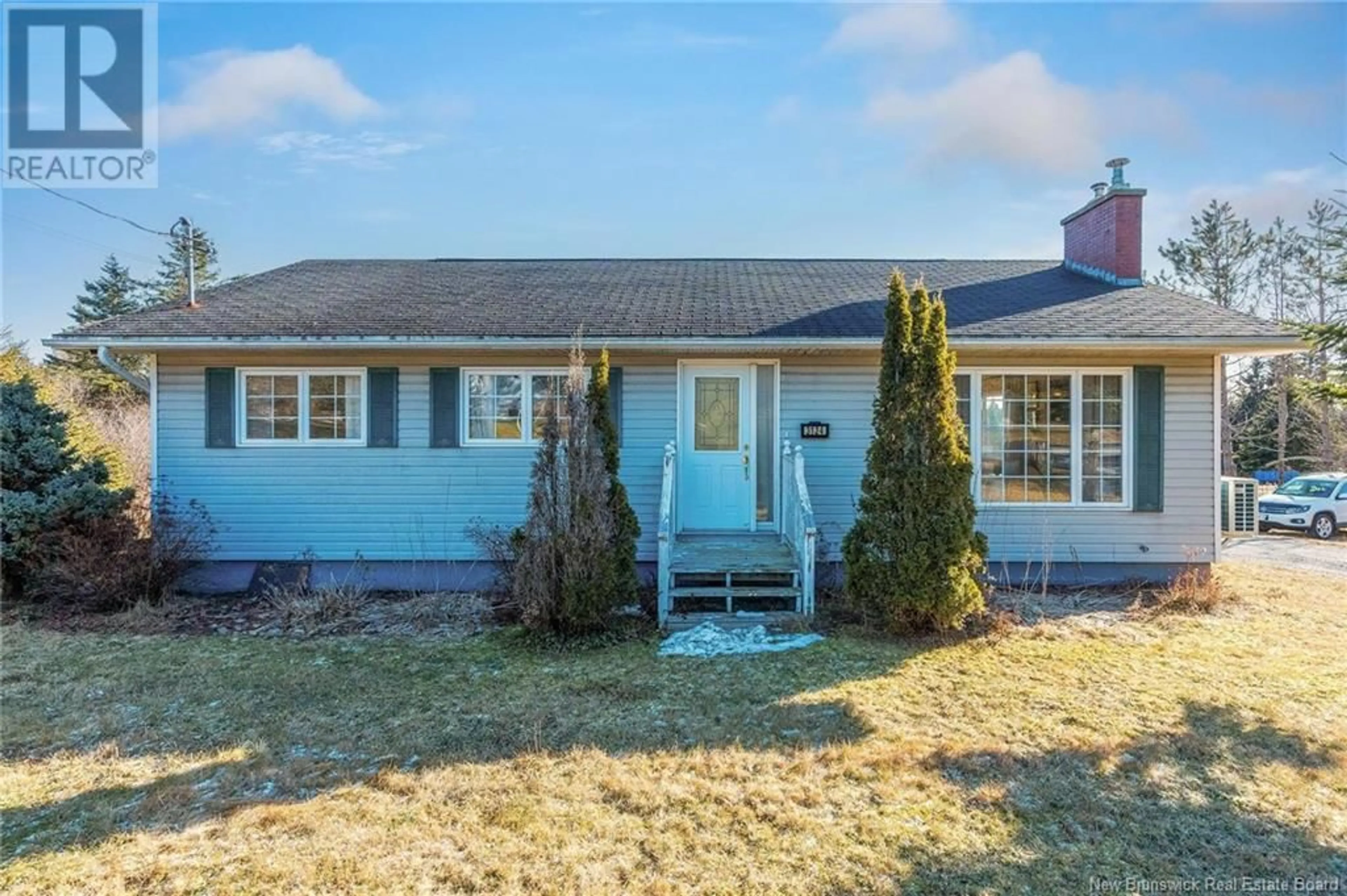 Home with vinyl exterior material, street for 3124 Loch Lomond Road, Saint John New Brunswick E2H1B3