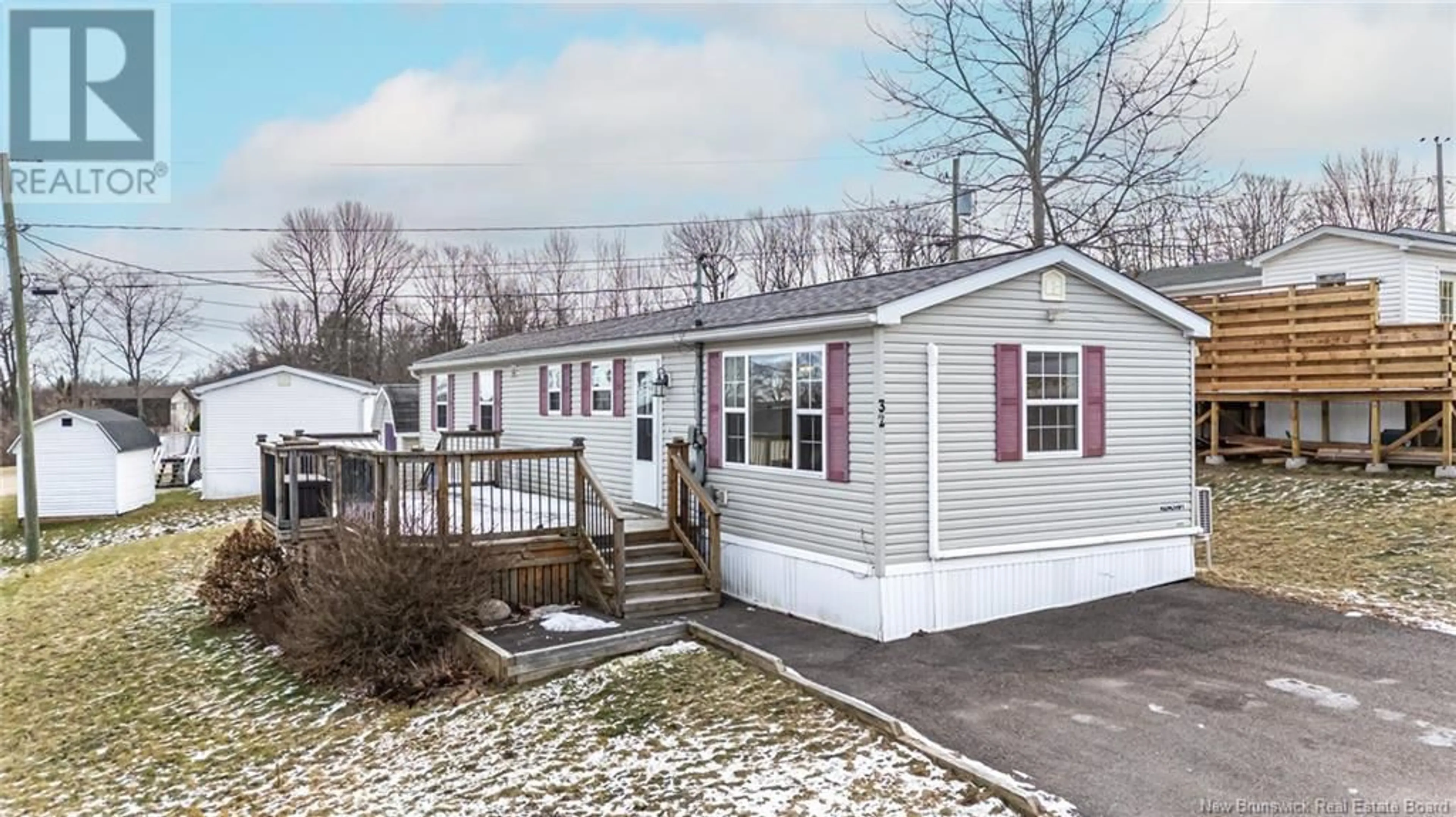 Home with vinyl exterior material, street for 32 Todd Street, Fredericton New Brunswick E3C2M4