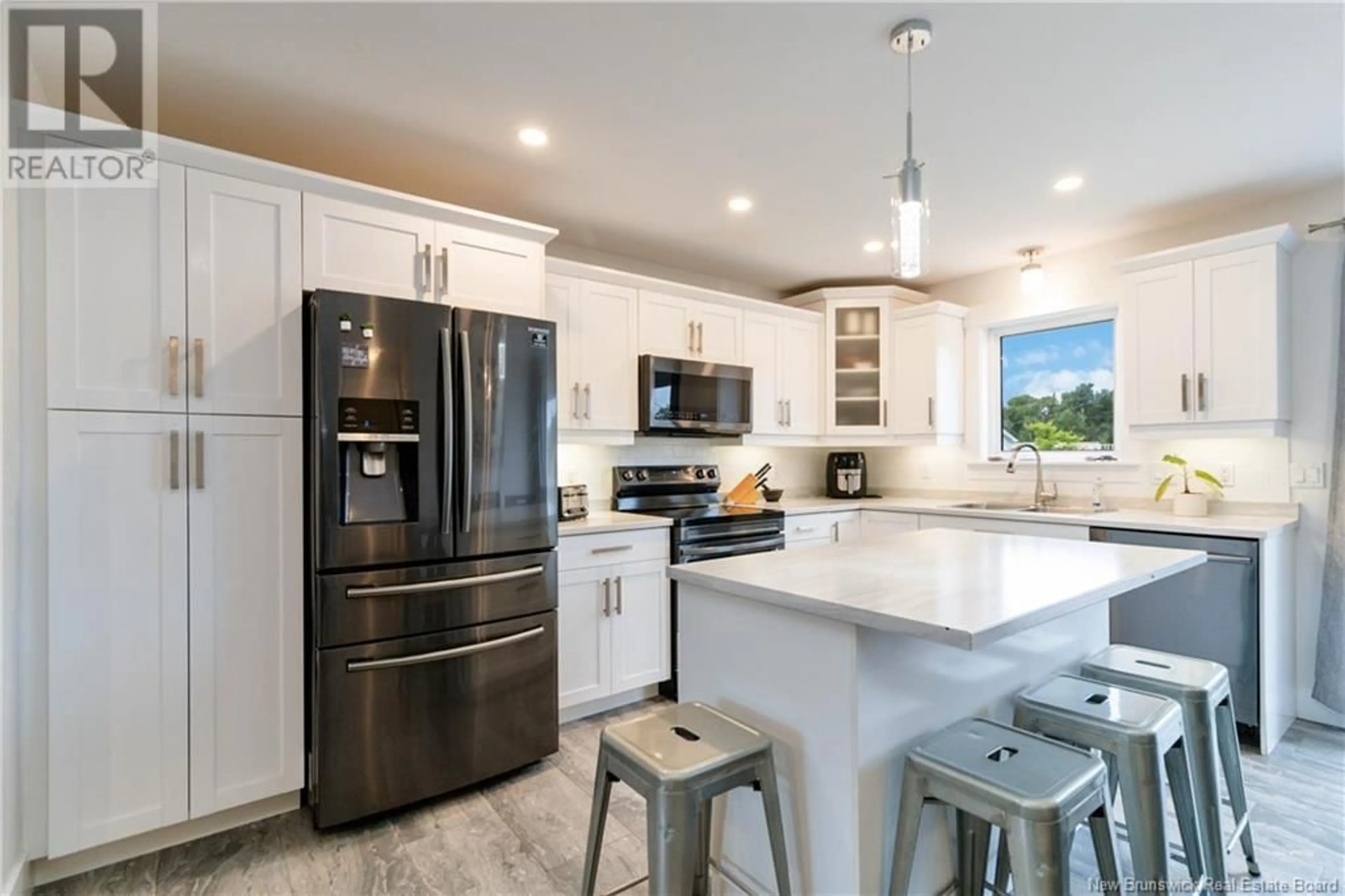 Open concept kitchen, ceramic/tile floor for 40 Pebble Creek Way, Moncton New Brunswick E1E0C8