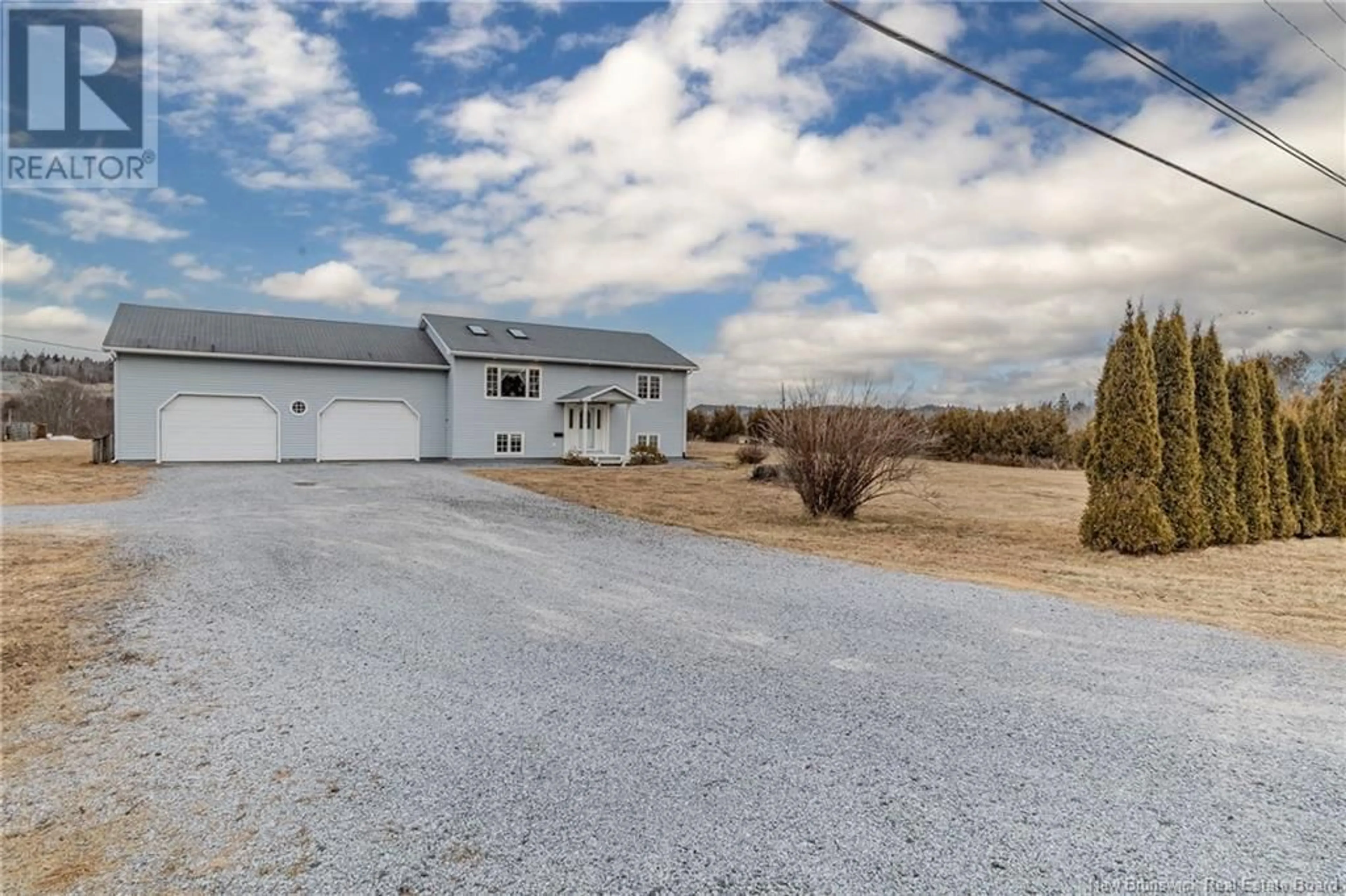 A pic from outside/outdoor area/front of a property/back of a property/a pic from drone, street for 2440 Ocean Westway, Saint John New Brunswick E2M5J4