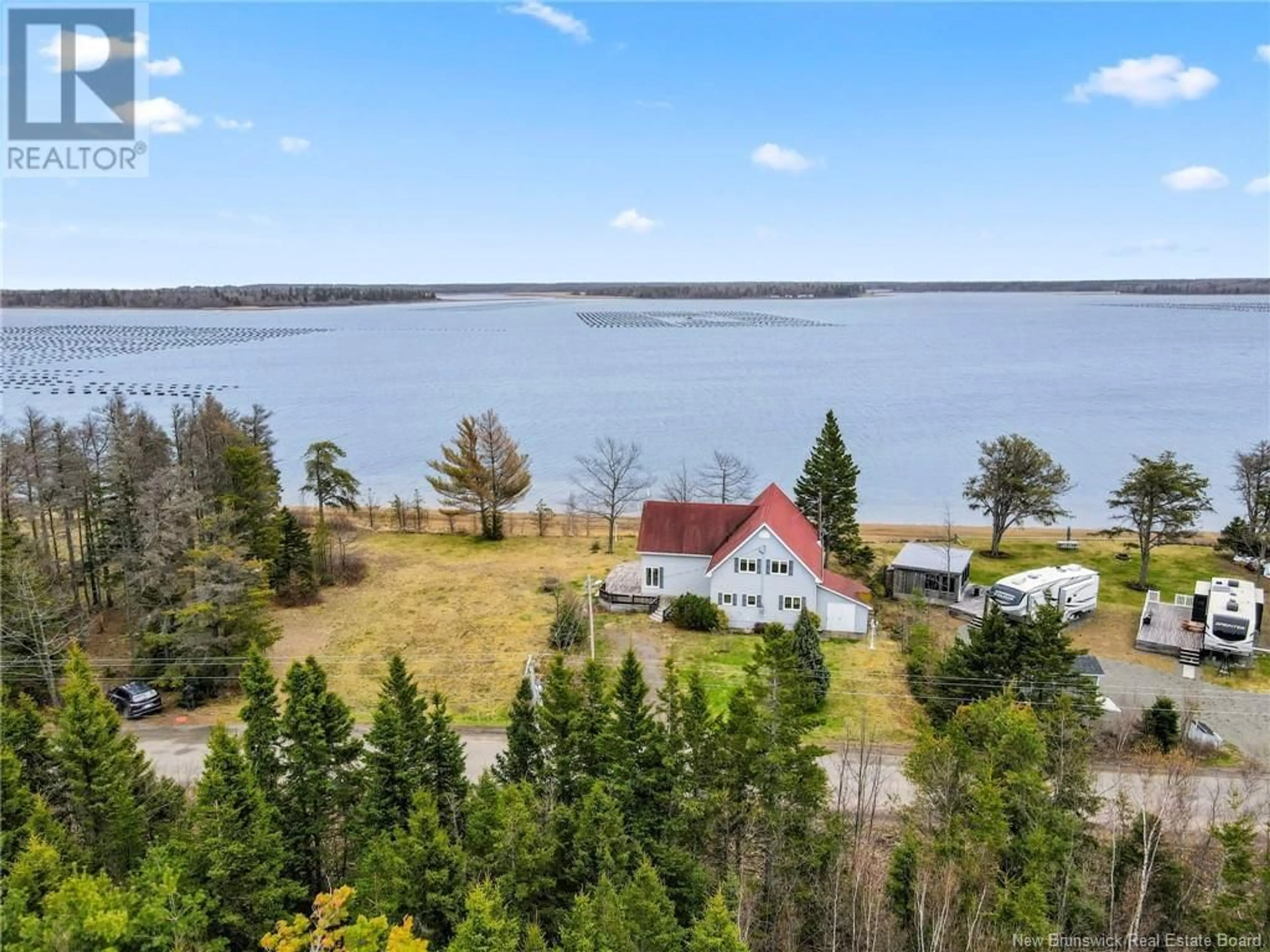 A pic from outside/outdoor area/front of a property/back of a property/a pic from drone, water/lake/river/ocean view for 730 de la Pointe, Richibouctou-Village New Brunswick E4W1G3