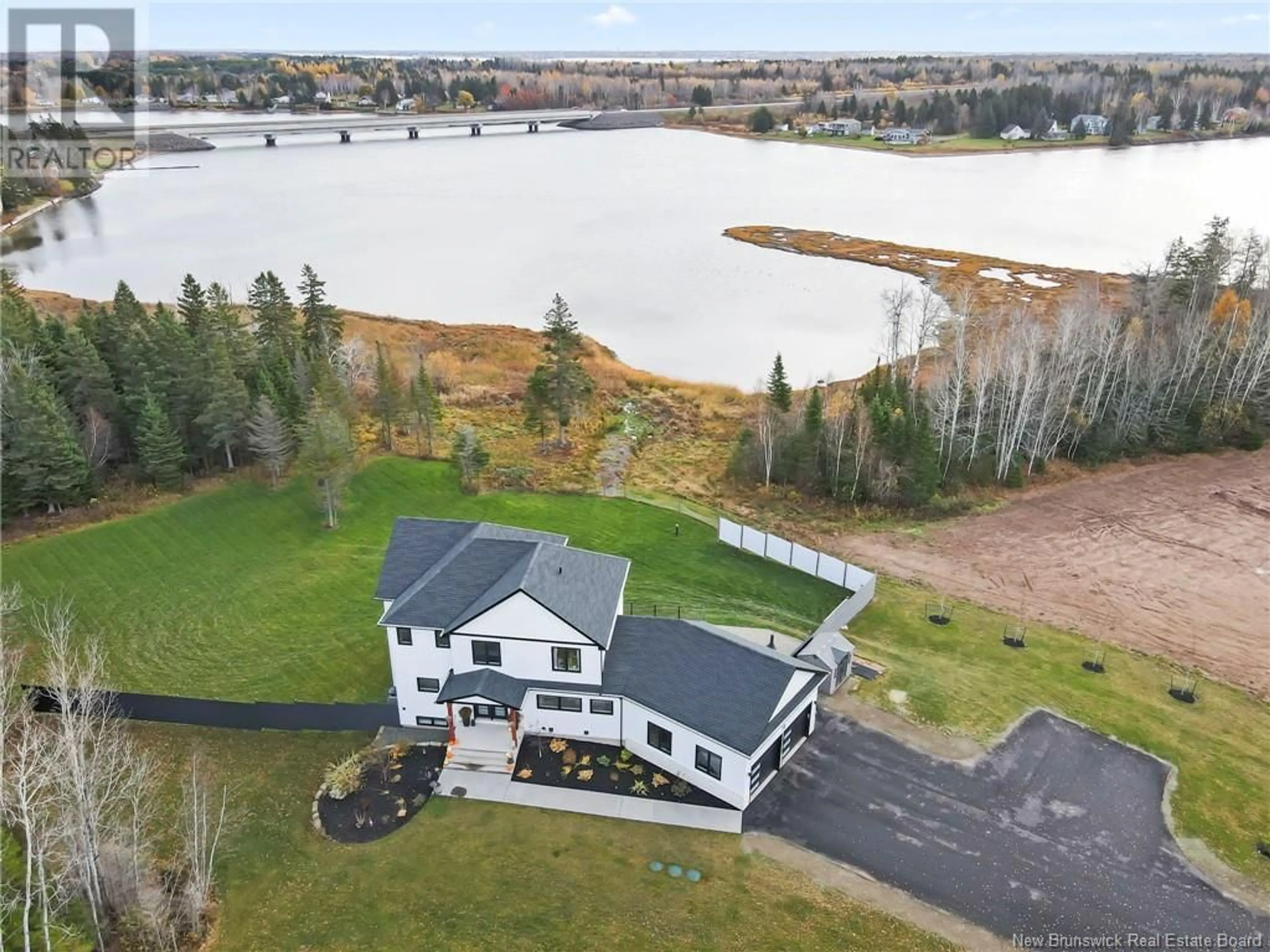 A pic from outside/outdoor area/front of a property/back of a property/a pic from drone, water/lake/river/ocean view for 74 Waterfront Drive, Shediac Bridge New Brunswick E4R0G1