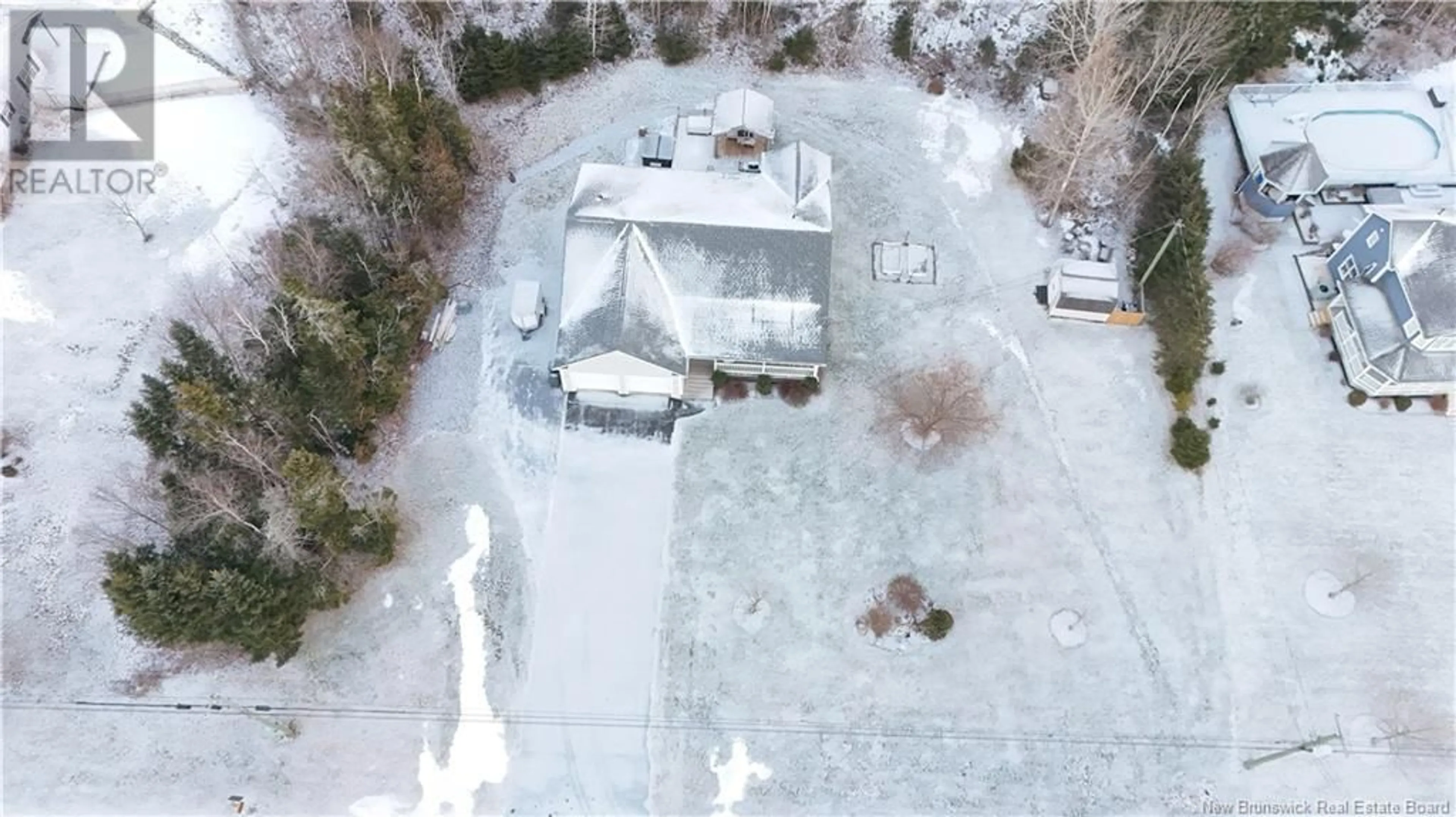 A pic from outside/outdoor area/front of a property/back of a property/a pic from drone, street for 44 Squire Drive, Quispamsis New Brunswick E2G1C1