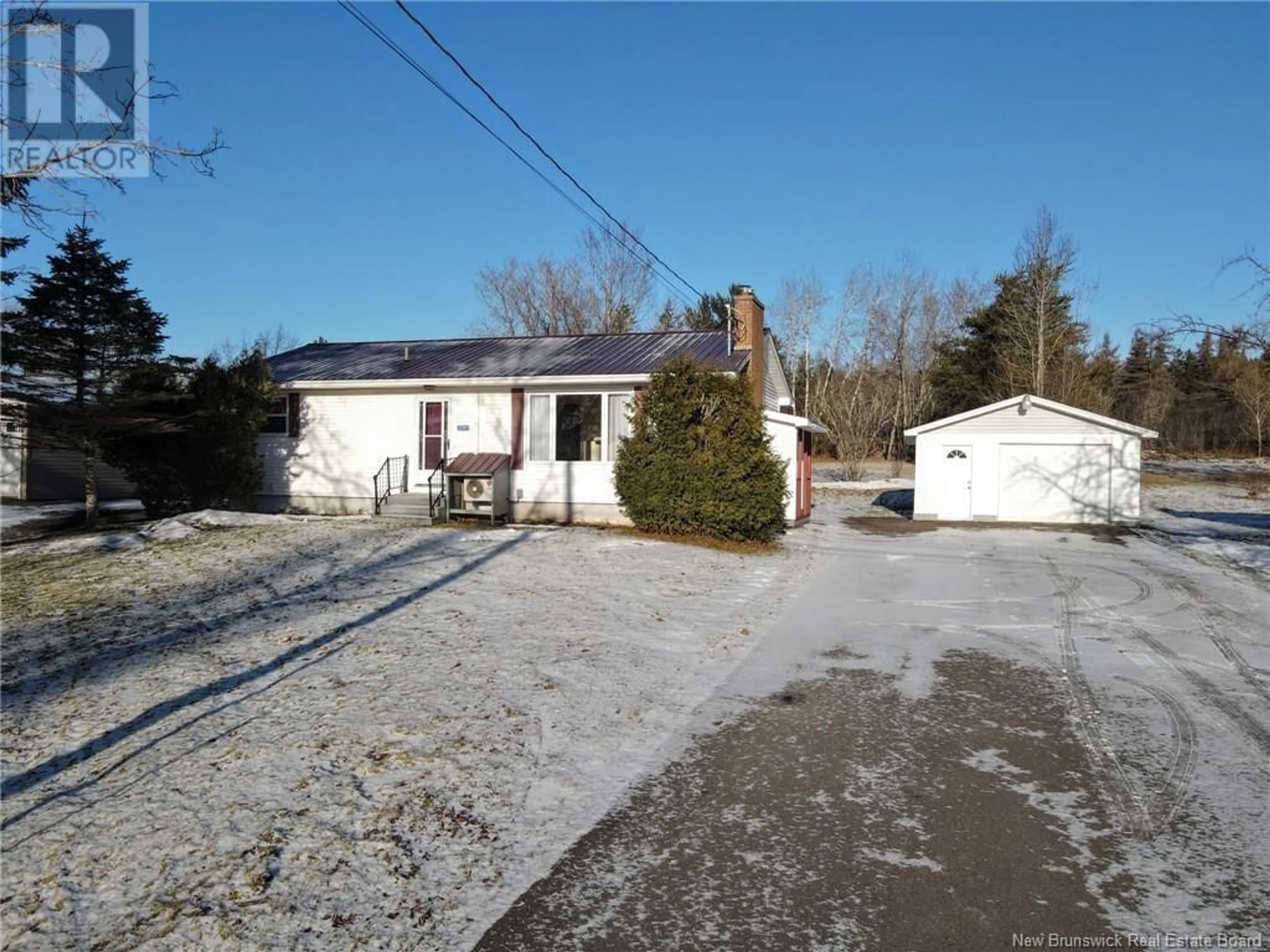 A pic from outside/outdoor area/front of a property/back of a property/a pic from drone, street for 3285 Main Street, Salisbury New Brunswick E4J2K9