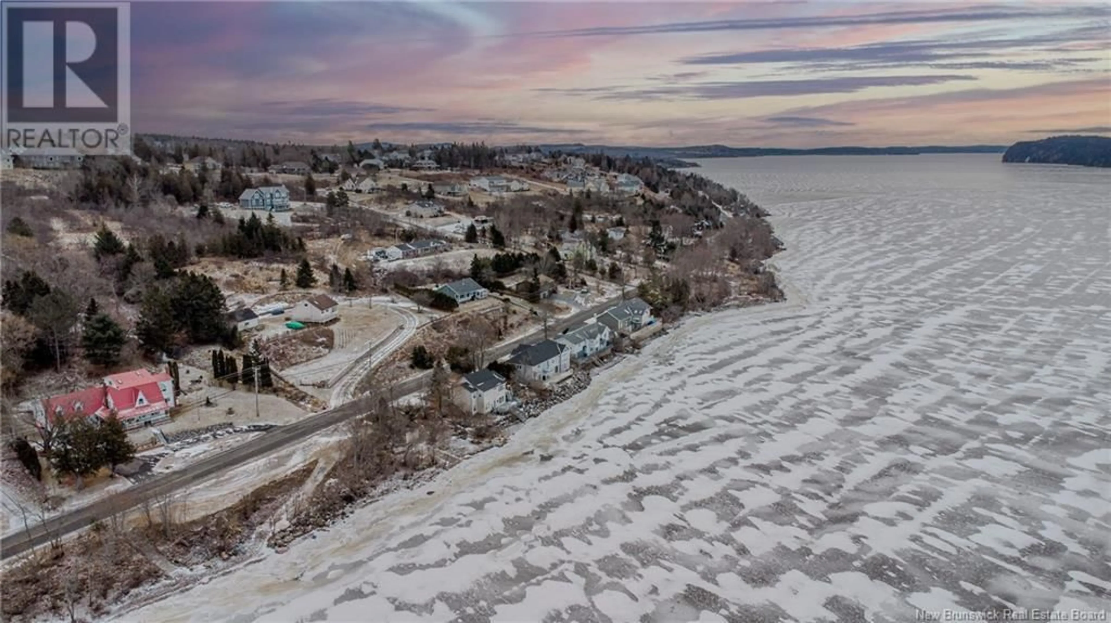 A pic from outside/outdoor area/front of a property/back of a property/a pic from drone, water/lake/river/ocean view for 500 Gondola Point Road, Quispamsis New Brunswick E2E1E4