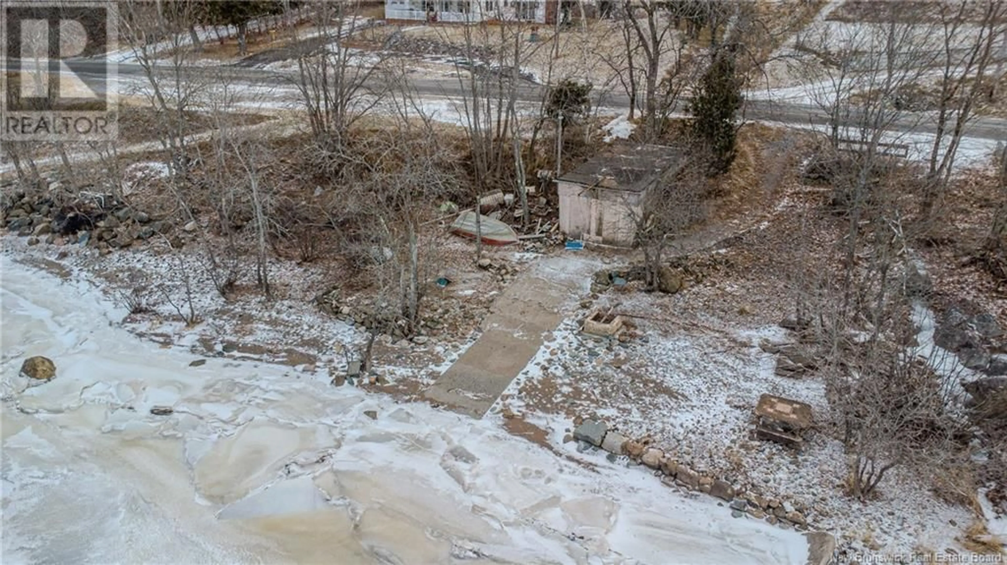 A pic from outside/outdoor area/front of a property/back of a property/a pic from drone, water/lake/river/ocean view for 500 Gondola Point Road, Quispamsis New Brunswick E2E1E4