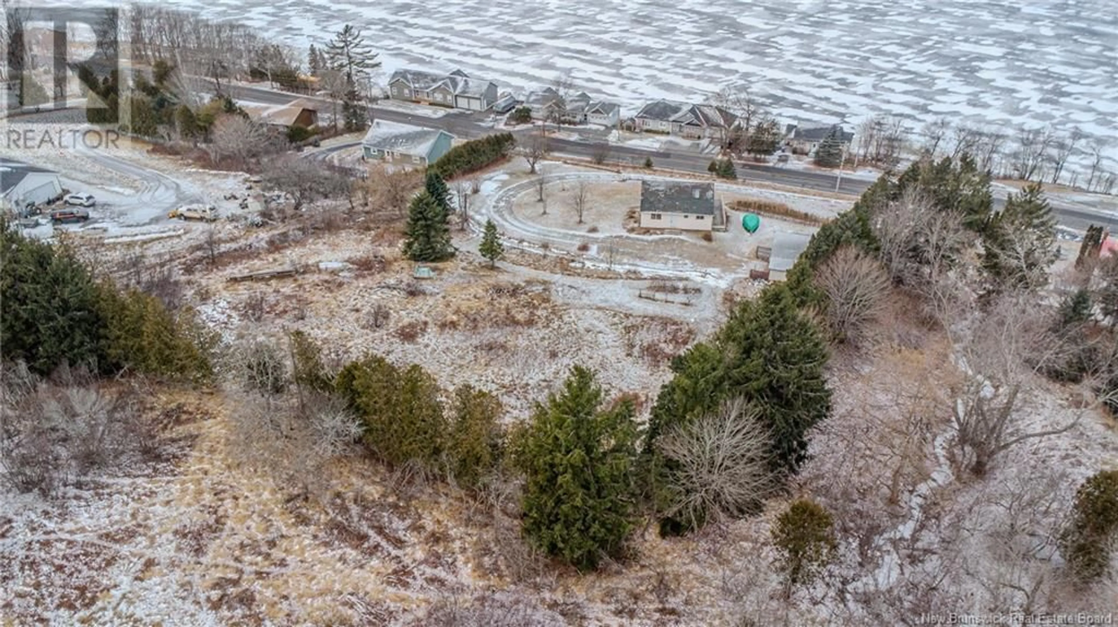 A pic from outside/outdoor area/front of a property/back of a property/a pic from drone, unknown for 500 Gondola Point Road, Quispamsis New Brunswick E2E1E4