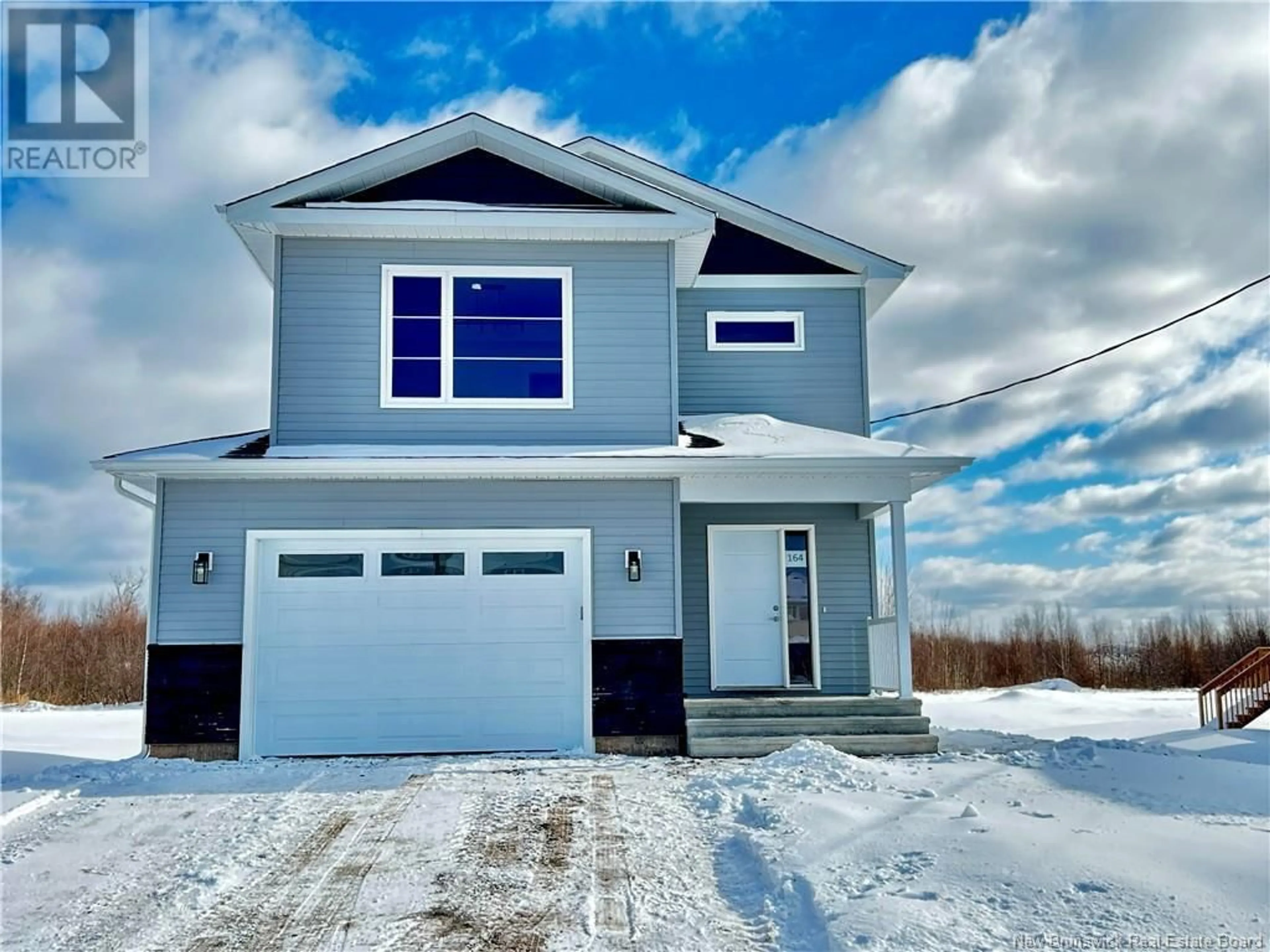 Home with vinyl exterior material, street for 164 Runneymeade Road, Riverview New Brunswick E1B0S7