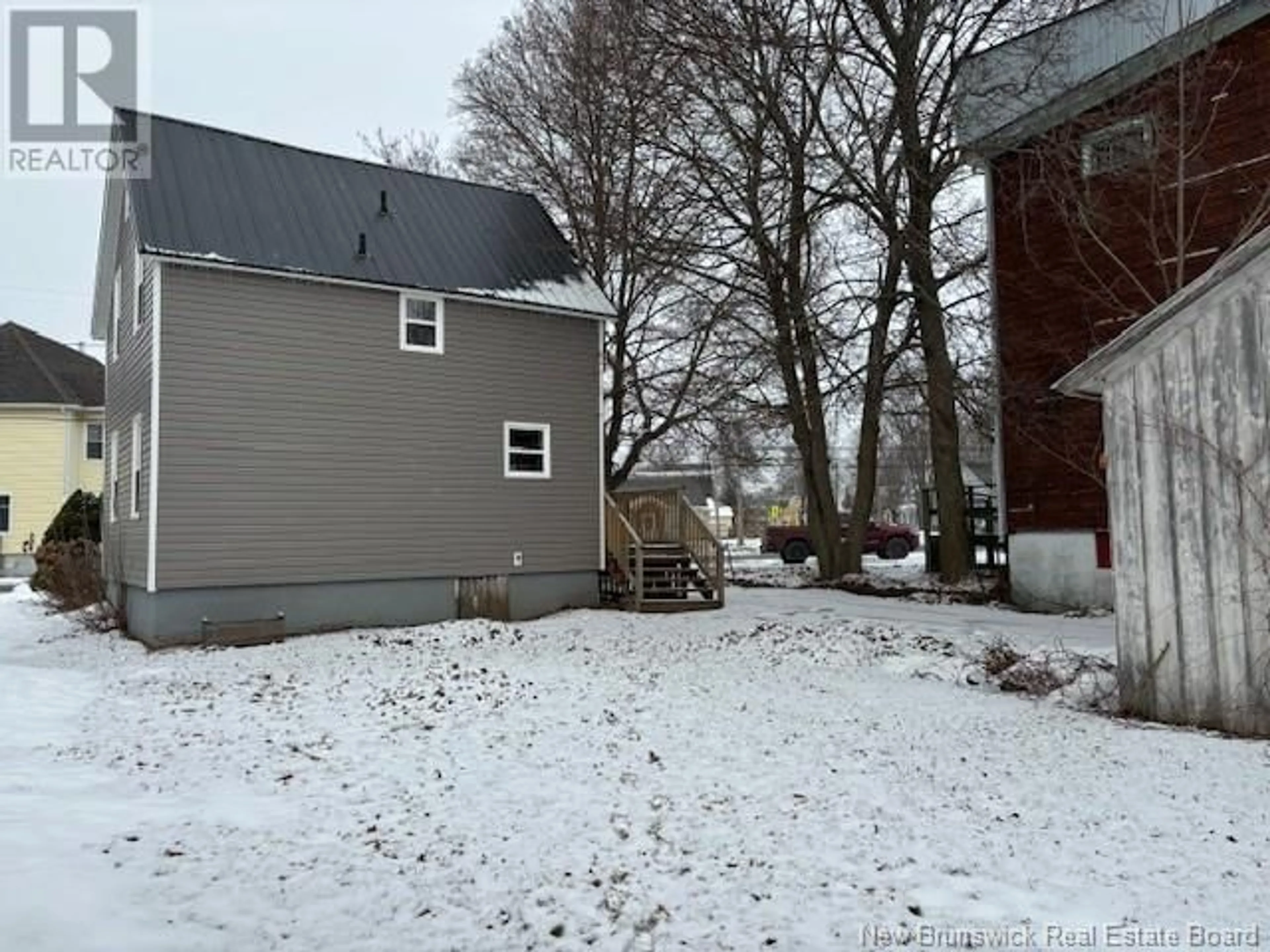 A pic from outside/outdoor area/front of a property/back of a property/a pic from drone, street for 10 Court Street, Sussex New Brunswick E4E1N6