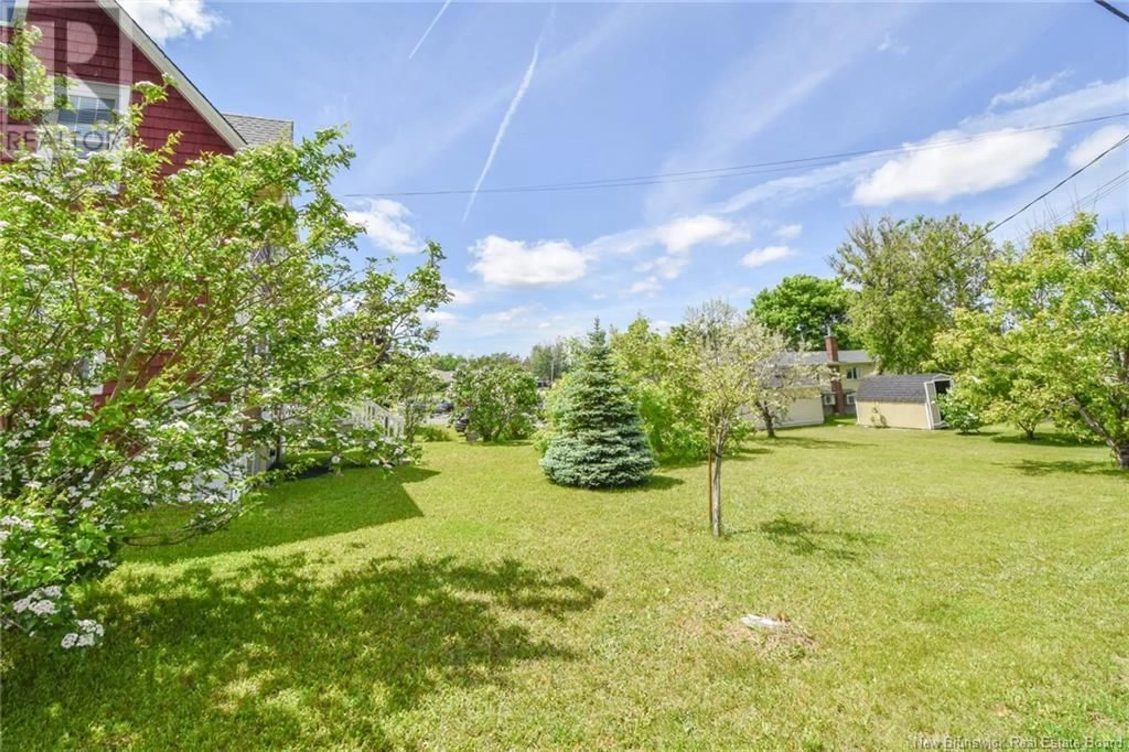 A pic from outside/outdoor area/front of a property/back of a property/a pic from drone, forest/trees view for 6 des Albert Lane, Caraquet New Brunswick E1W1B6