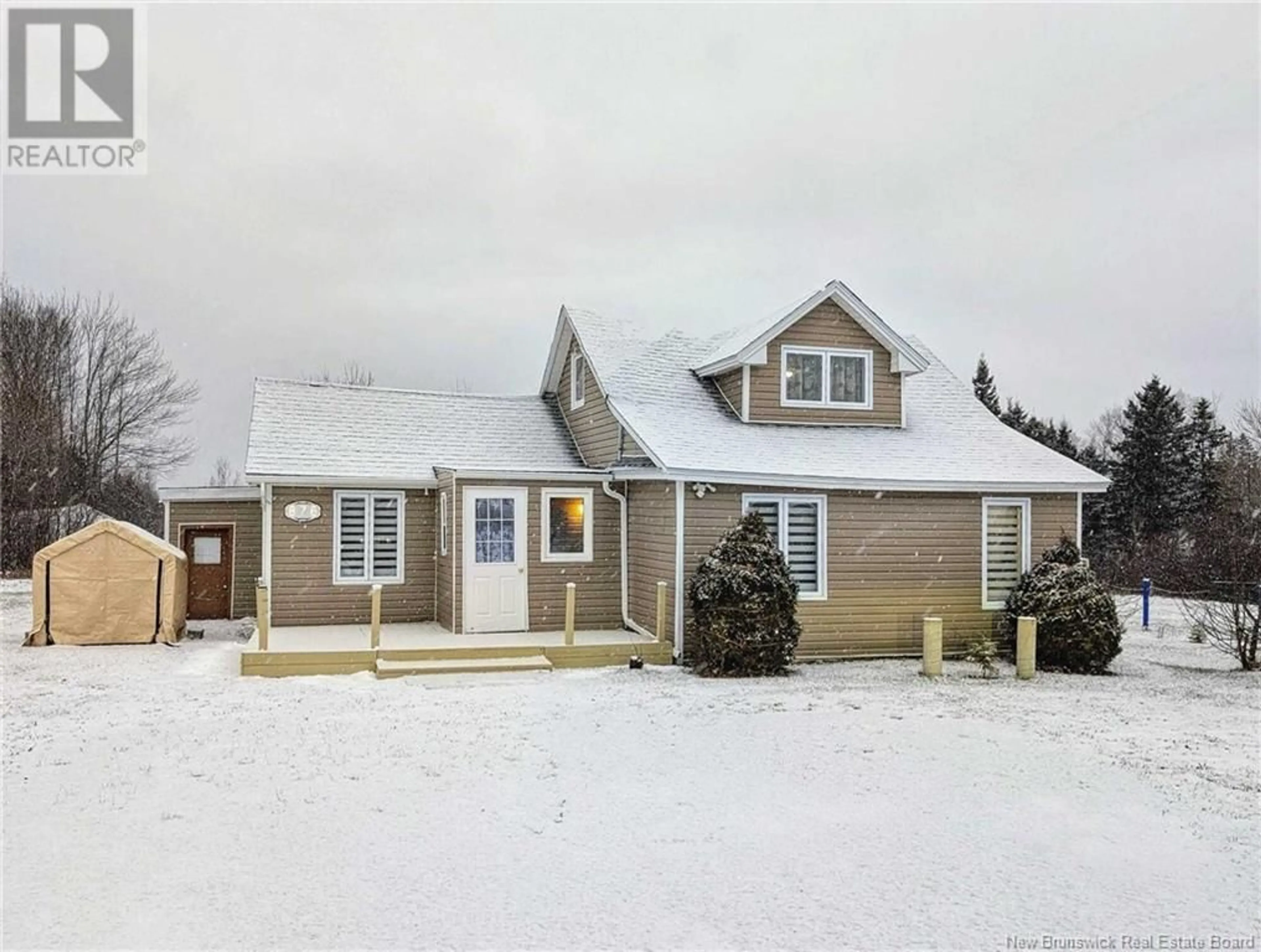 Home with vinyl exterior material, street for 876 Saint-Joseph Boulevard, Saint-Léolin New Brunswick E8N2P8