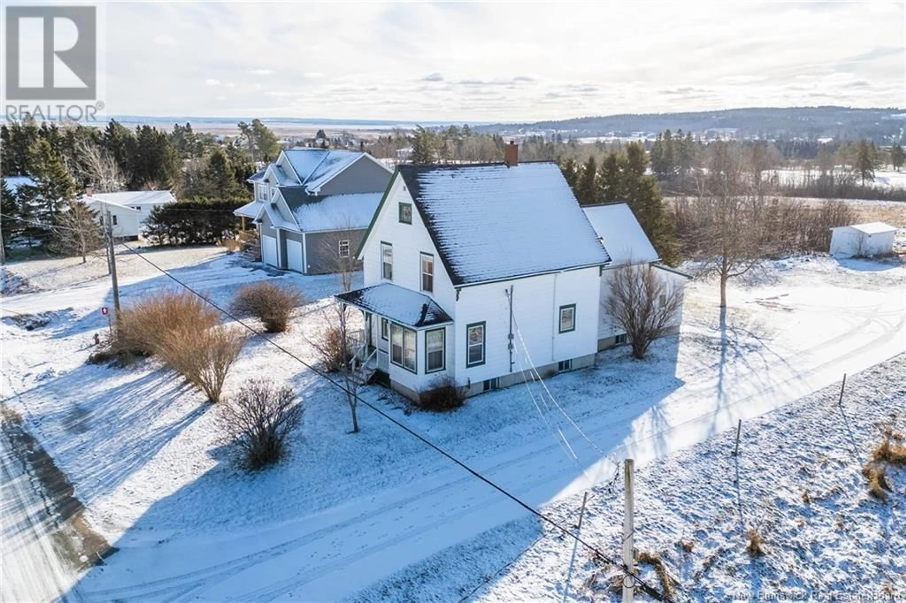 A pic from outside/outdoor area/front of a property/back of a property/a pic from drone, street for 64 Fairfield Road, Sackville New Brunswick E4L2X8