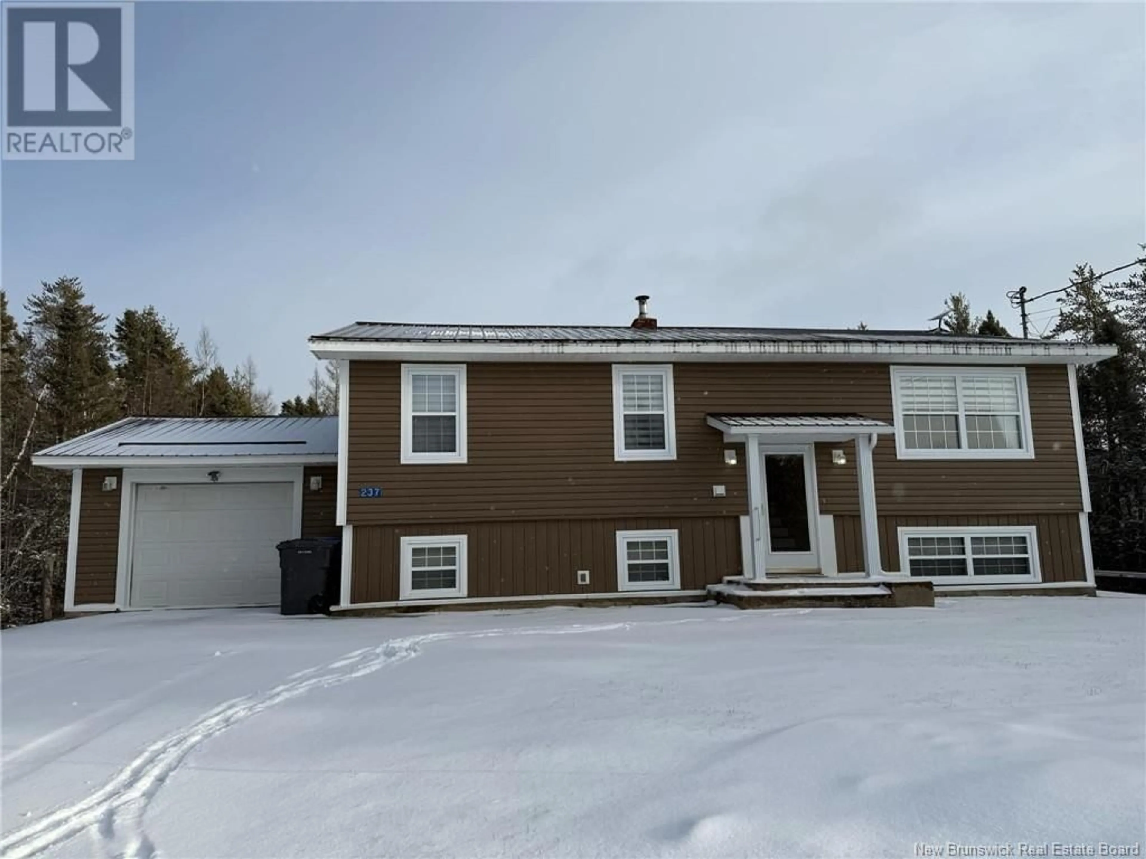 Home with vinyl exterior material, street for 237 Eel River Road, Baie-Sainte-Anne New Brunswick E9A1N8