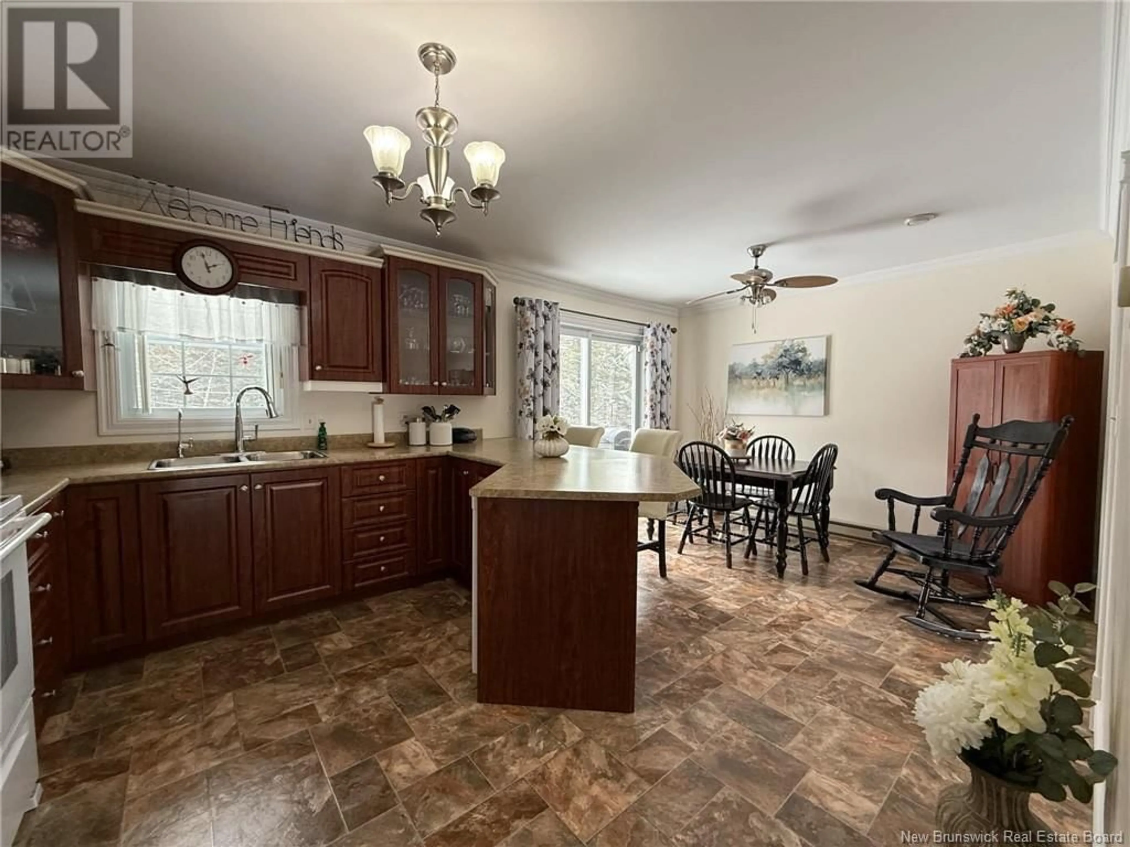 Open concept kitchen, ceramic/tile floor for 237 Eel River Road, Baie-Sainte-Anne New Brunswick E9A1N8