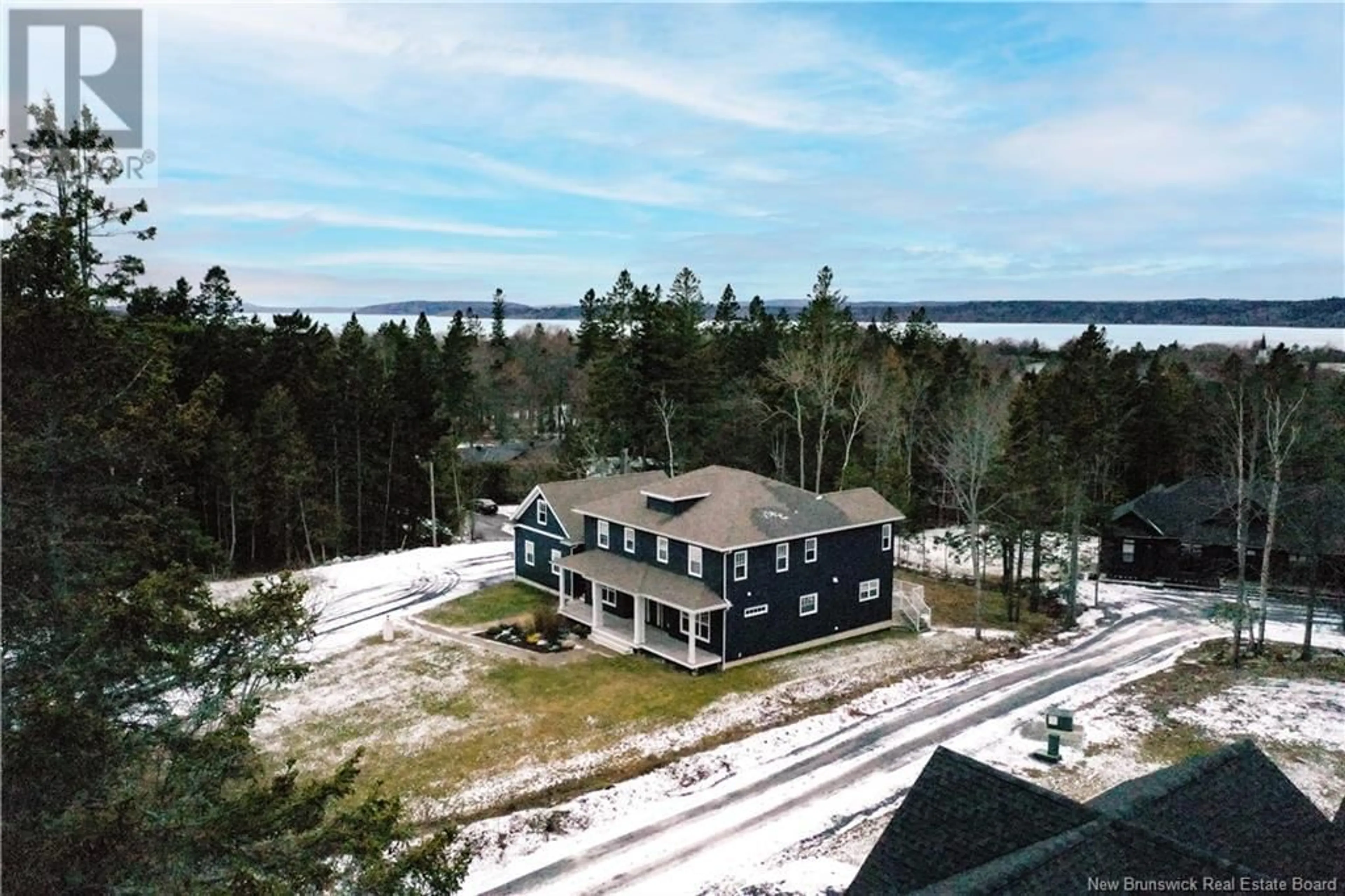 A pic from outside/outdoor area/front of a property/back of a property/a pic from drone, water/lake/river/ocean view for 7 Brock Court, Rothesay New Brunswick E2E5E6