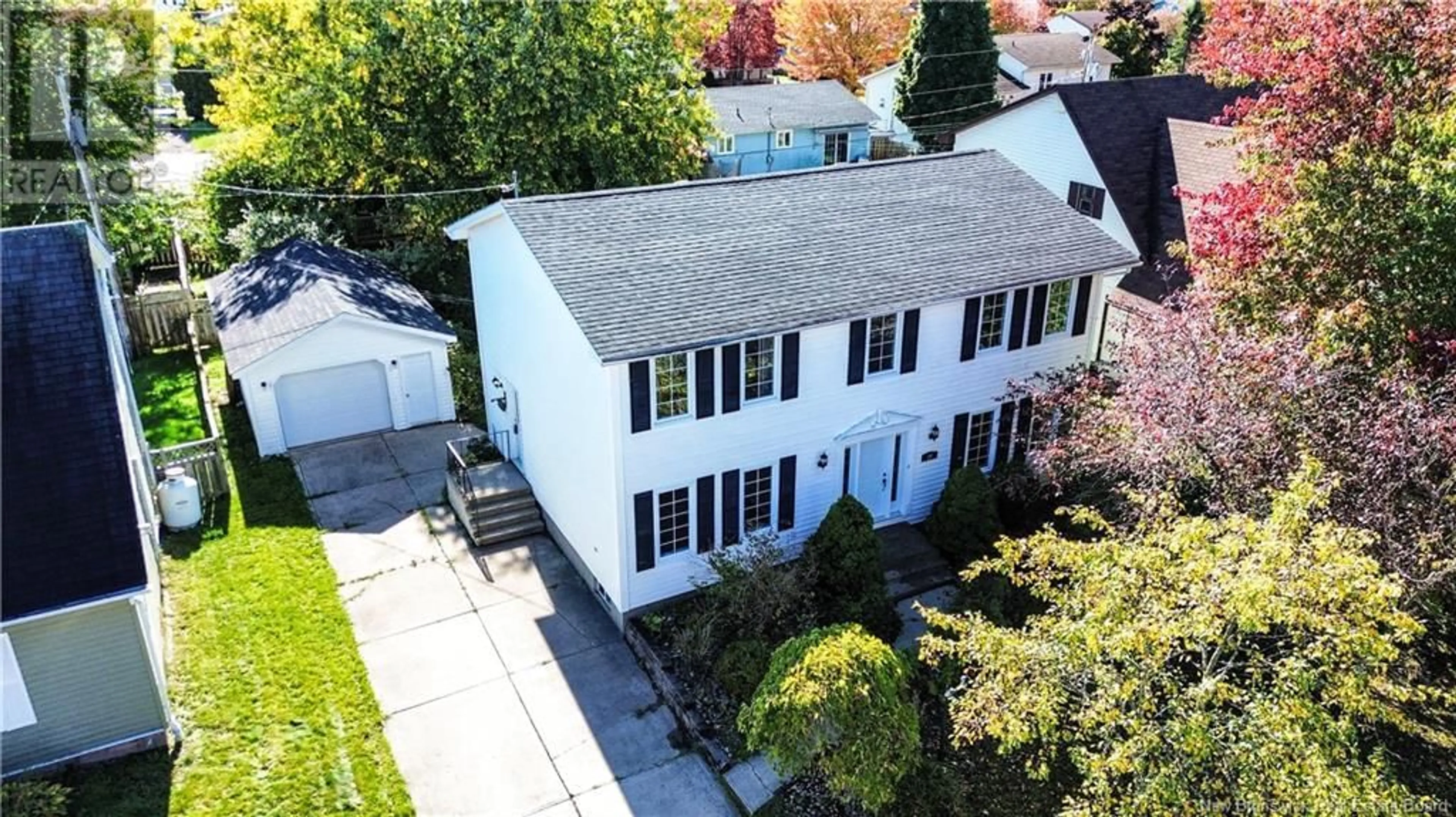 A pic from outside/outdoor area/front of a property/back of a property/a pic from drone, street for 14 Amberwood Court, Moncton New Brunswick E1C9H1