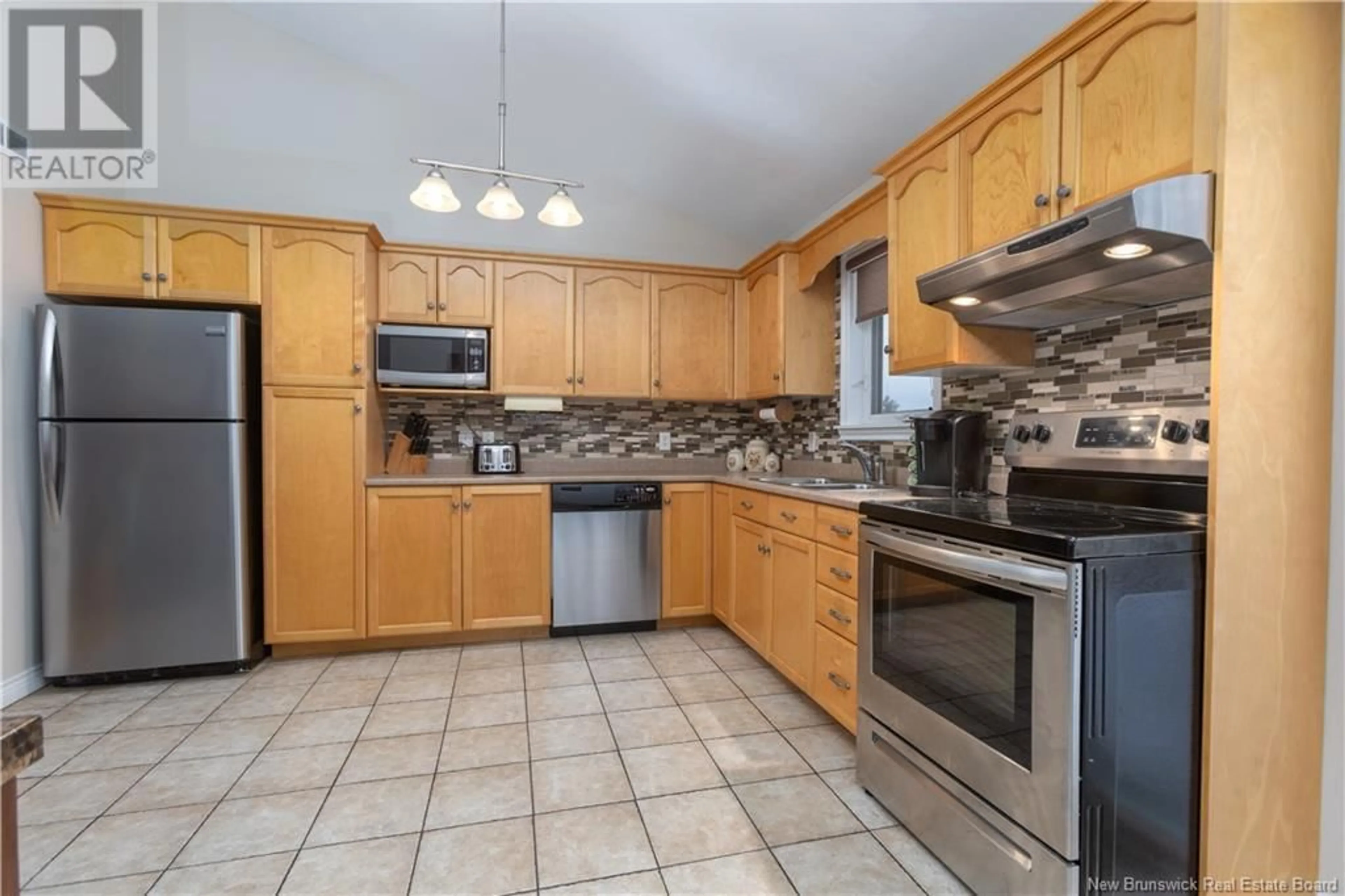 Standard kitchen, ceramic/tile floor for 54 Nicolas Street, Dieppe New Brunswick E1A8L7