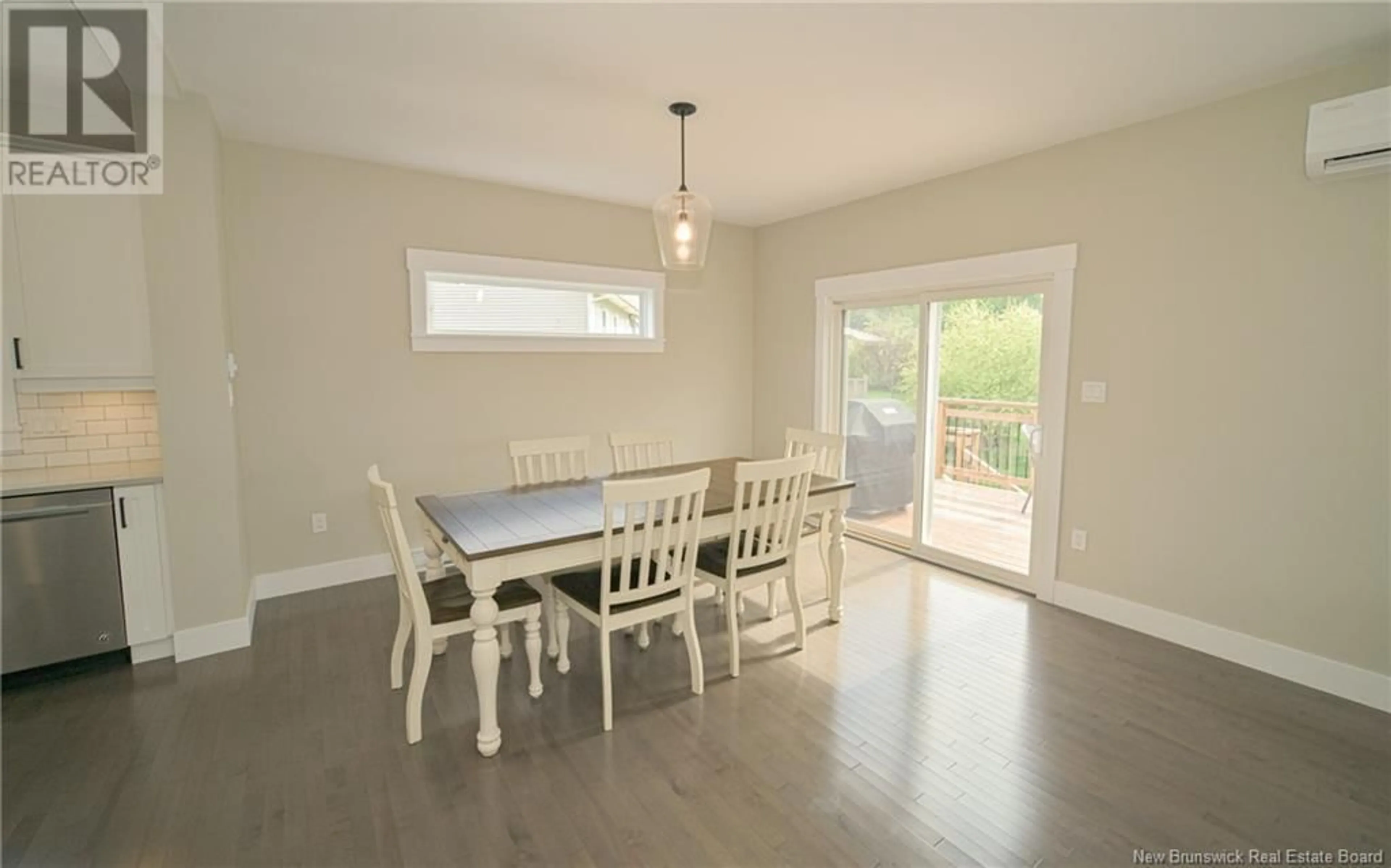 Dining room, wood/laminate floor for 46 Whisperwood Drive, Fredericton New Brunswick E3C0J7