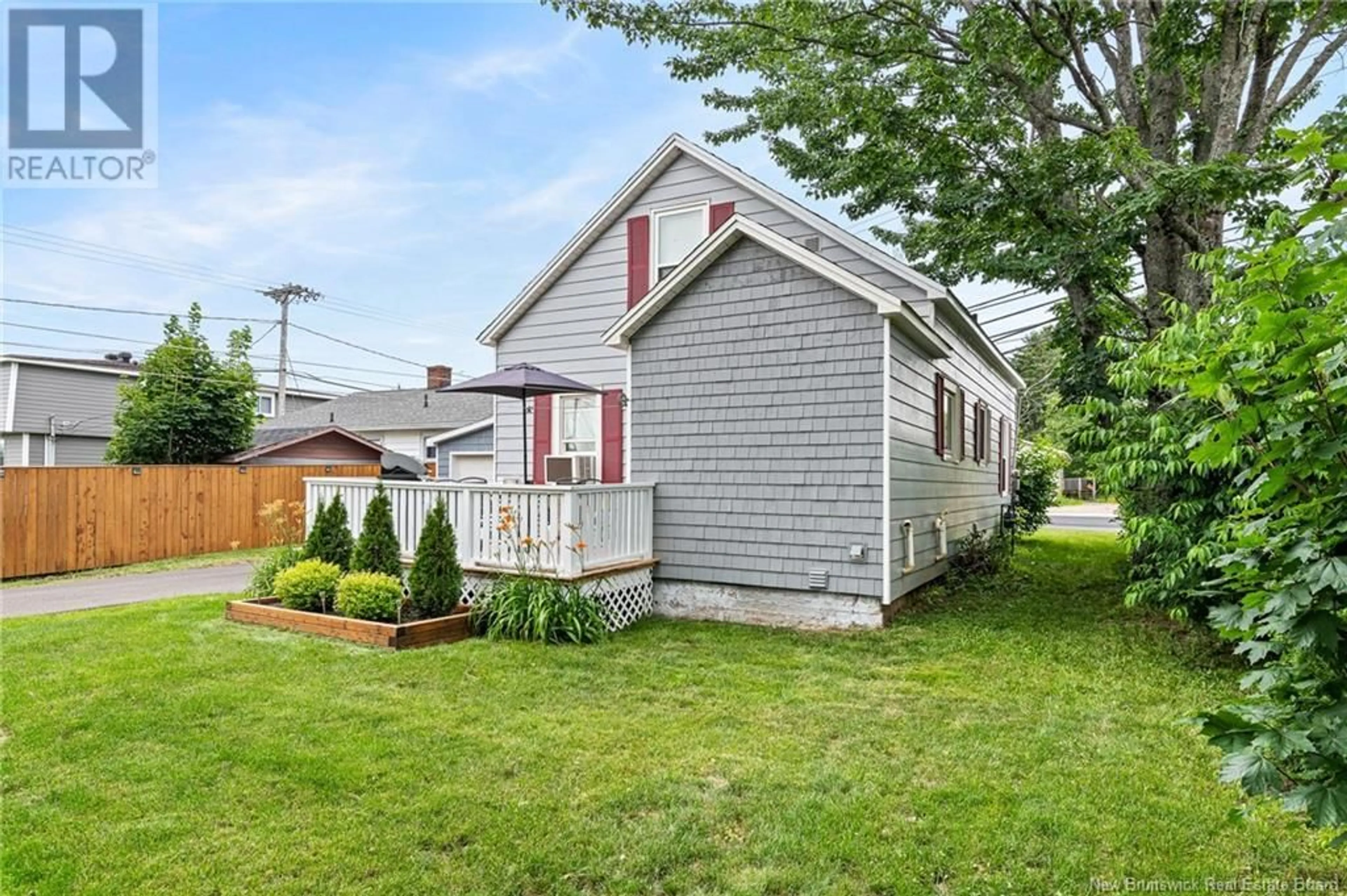 Home with vinyl exterior material, street for 603 Elmwood Drive, Moncton New Brunswick E1A2X4