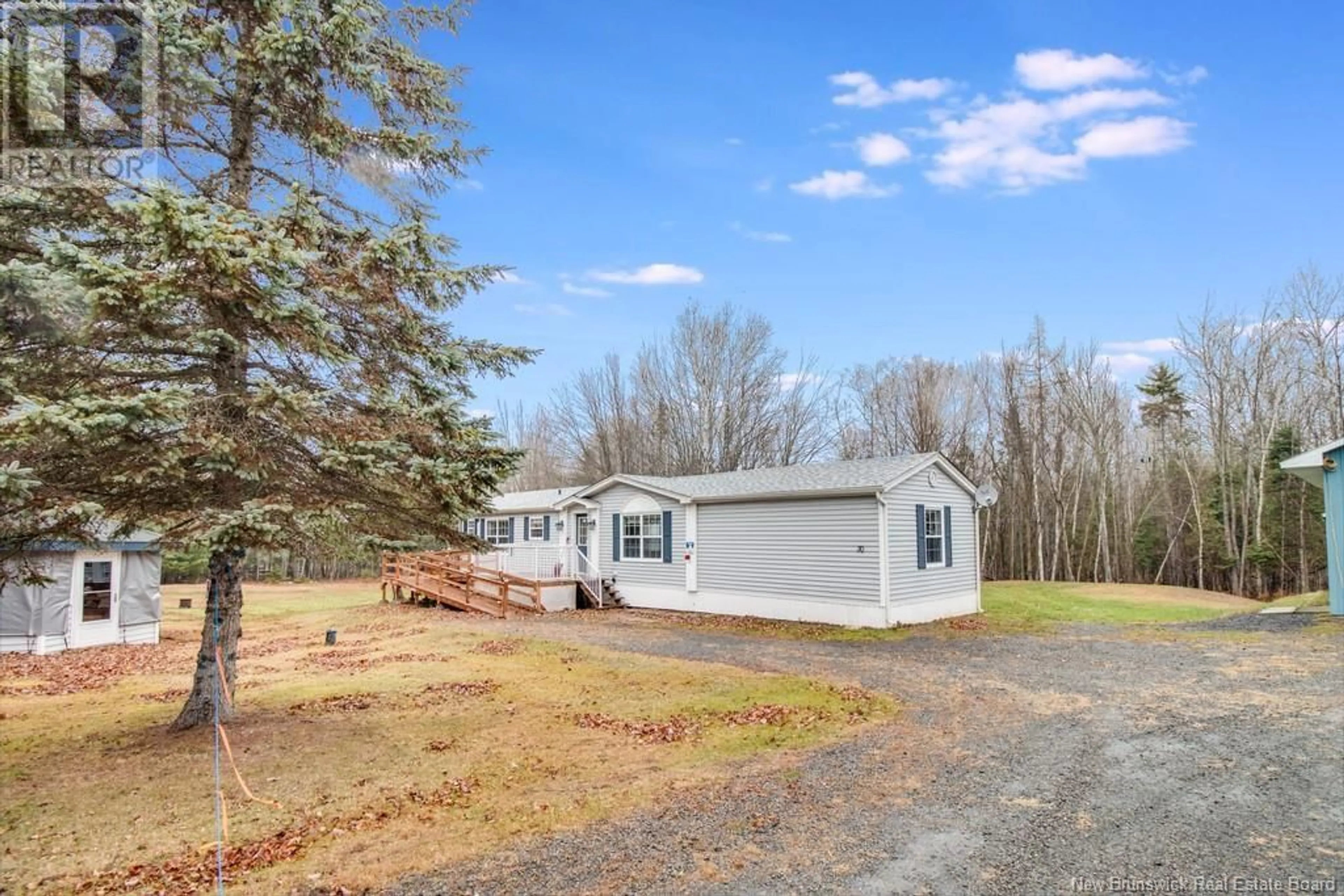 A pic from outside/outdoor area/front of a property/back of a property/a pic from drone, water/lake/river/ocean view for 30 Back Road, Douglas Harbour New Brunswick E4B1V2