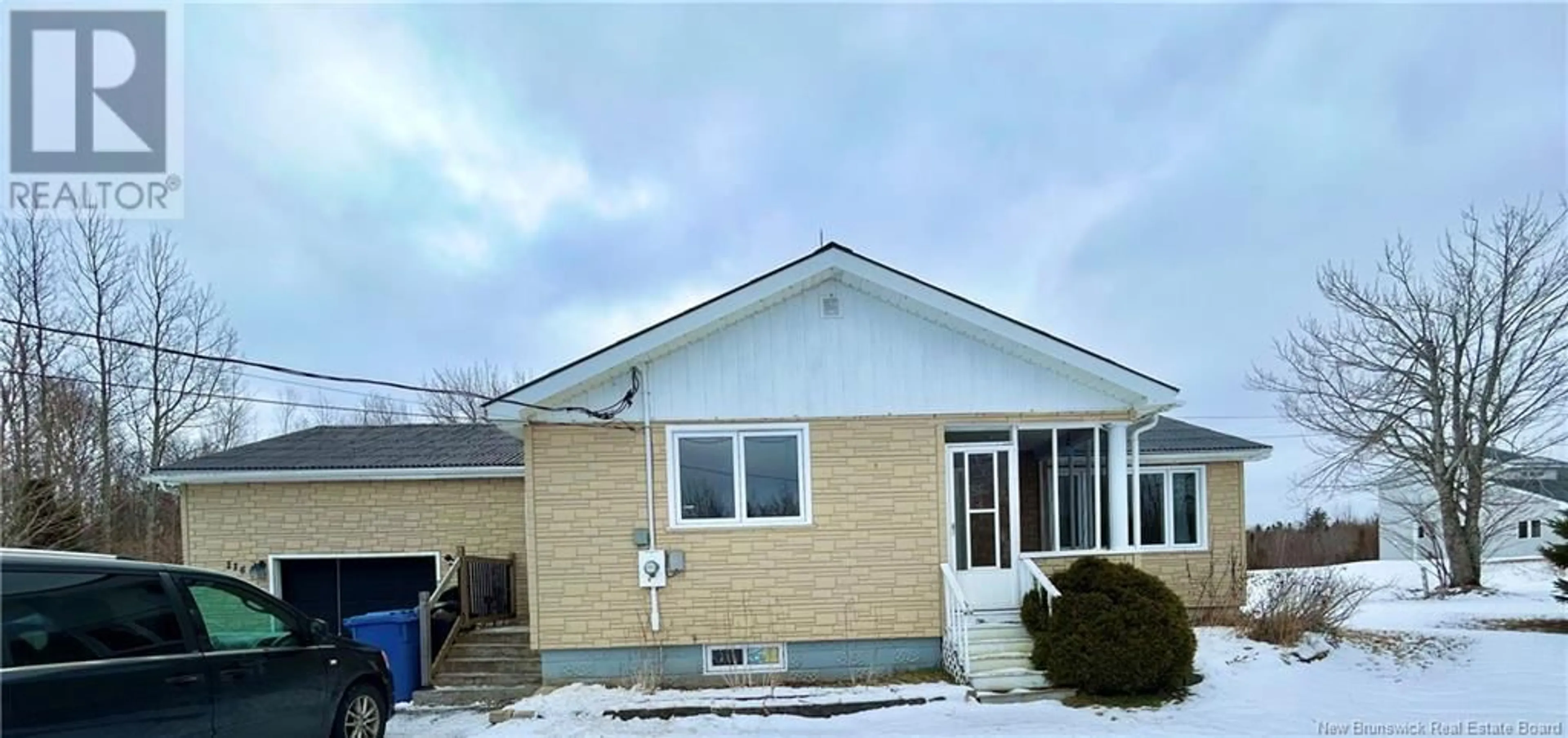 Home with vinyl exterior material, building for 114 Lebouthillier Street, Saint-Simon New Brunswick E8P1Z7