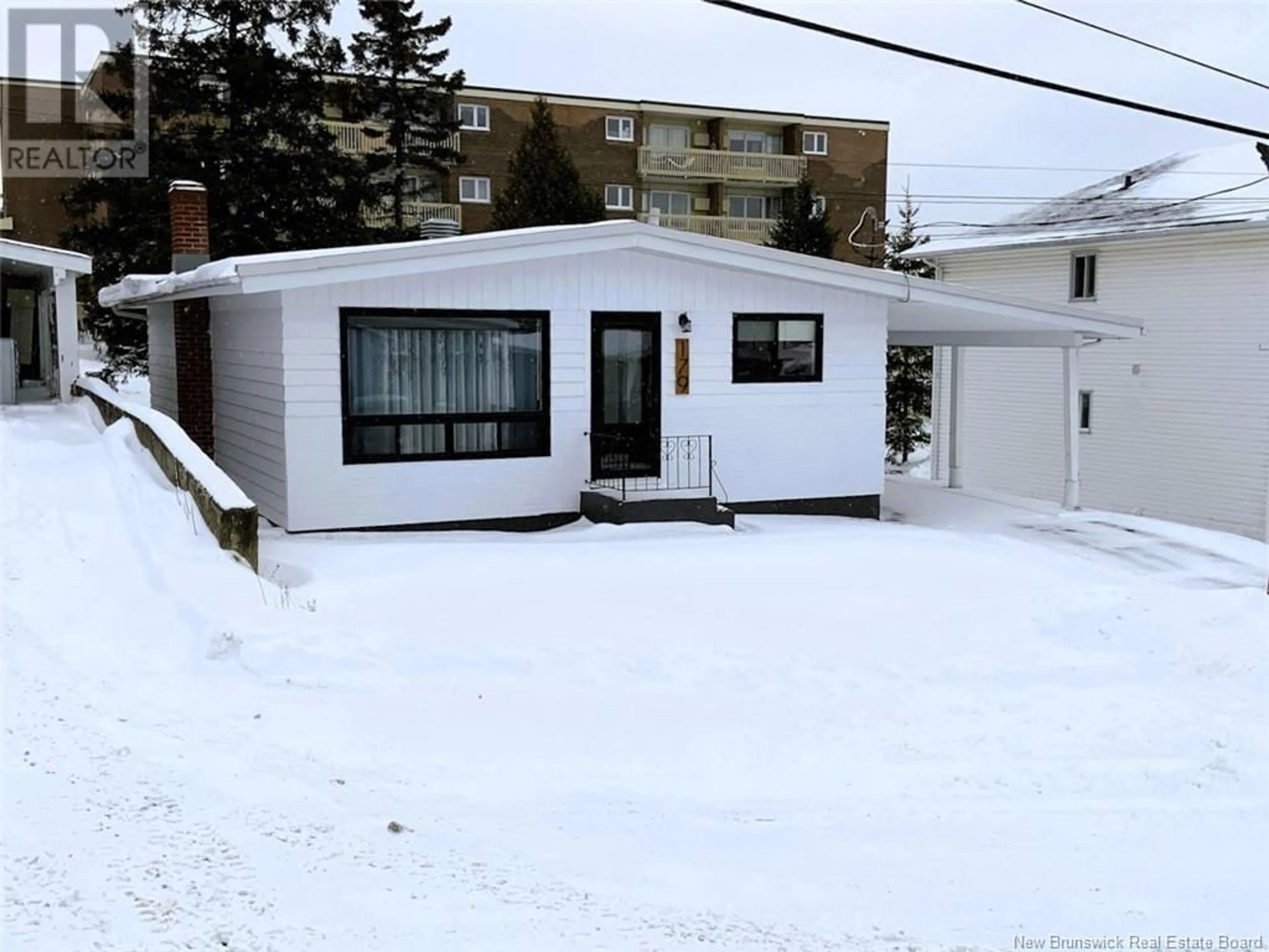 Home with vinyl exterior material, street for 179 34E Avenue, Edmundston New Brunswick E3V2T4