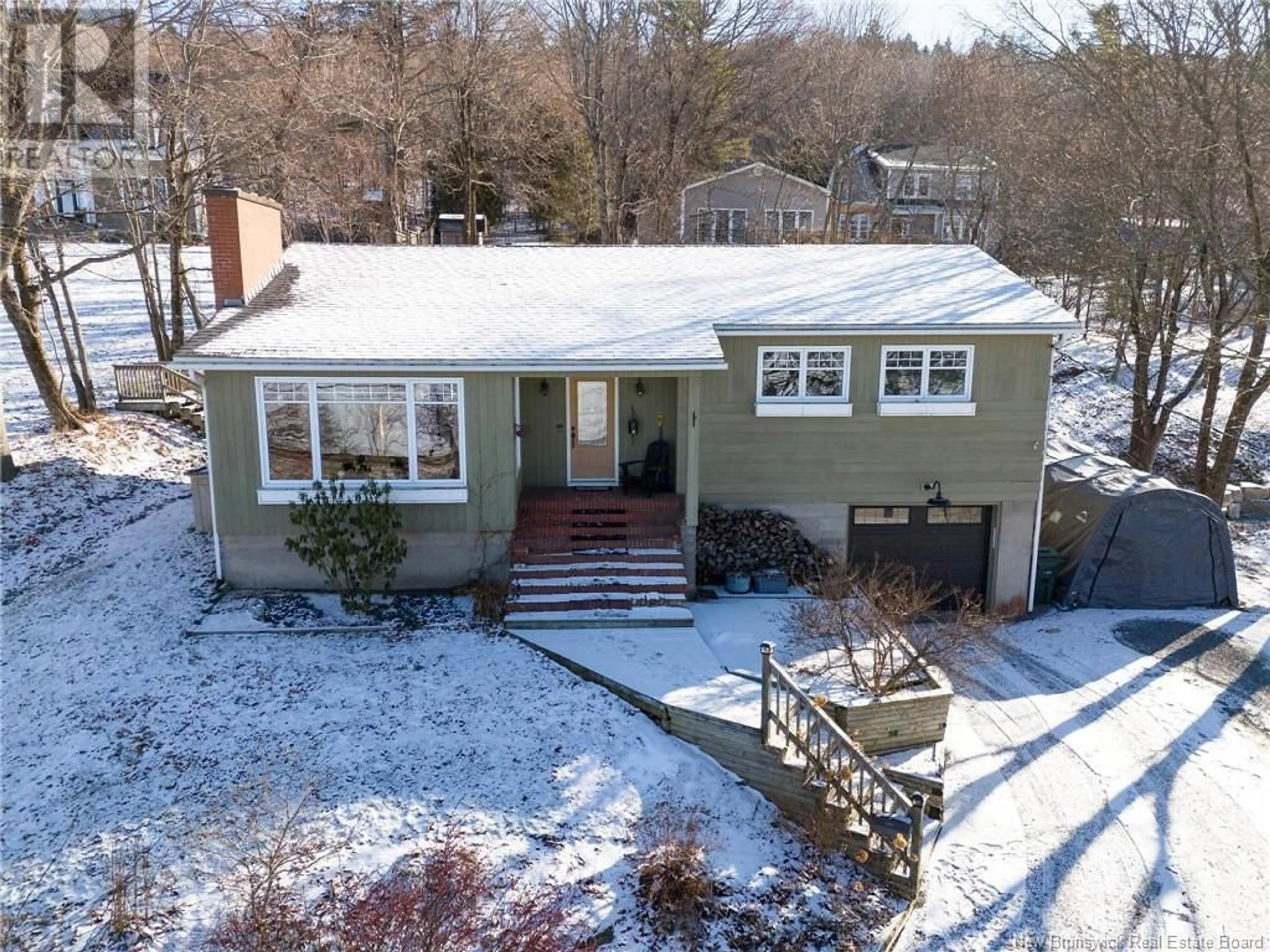 A pic from outside/outdoor area/front of a property/back of a property/a pic from drone, street for 2280 Rothesay Road, Rothesay New Brunswick E2H2K5