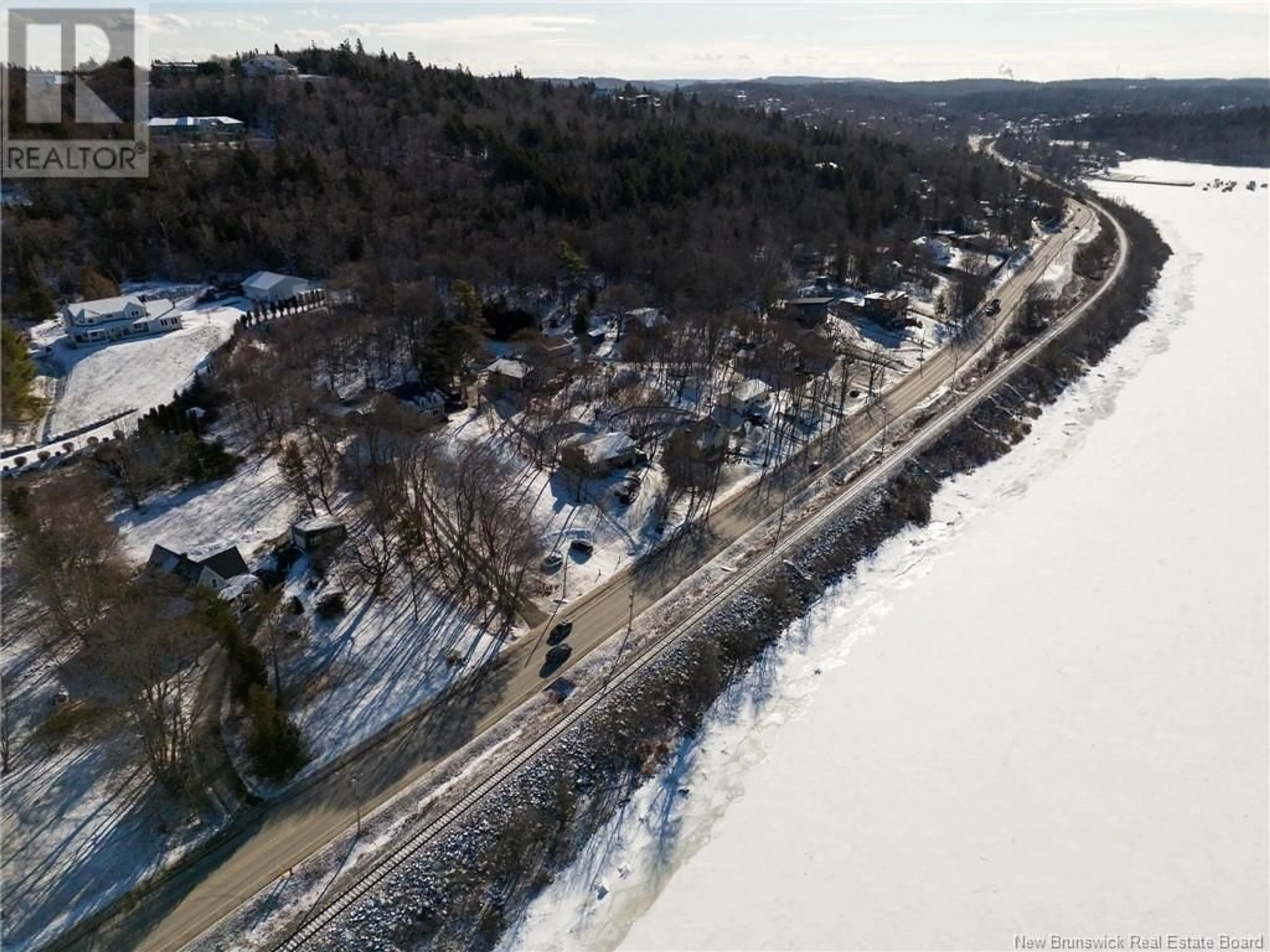 A pic from outside/outdoor area/front of a property/back of a property/a pic from drone, water/lake/river/ocean view for 2280 Rothesay Road, Rothesay New Brunswick E2H2K5