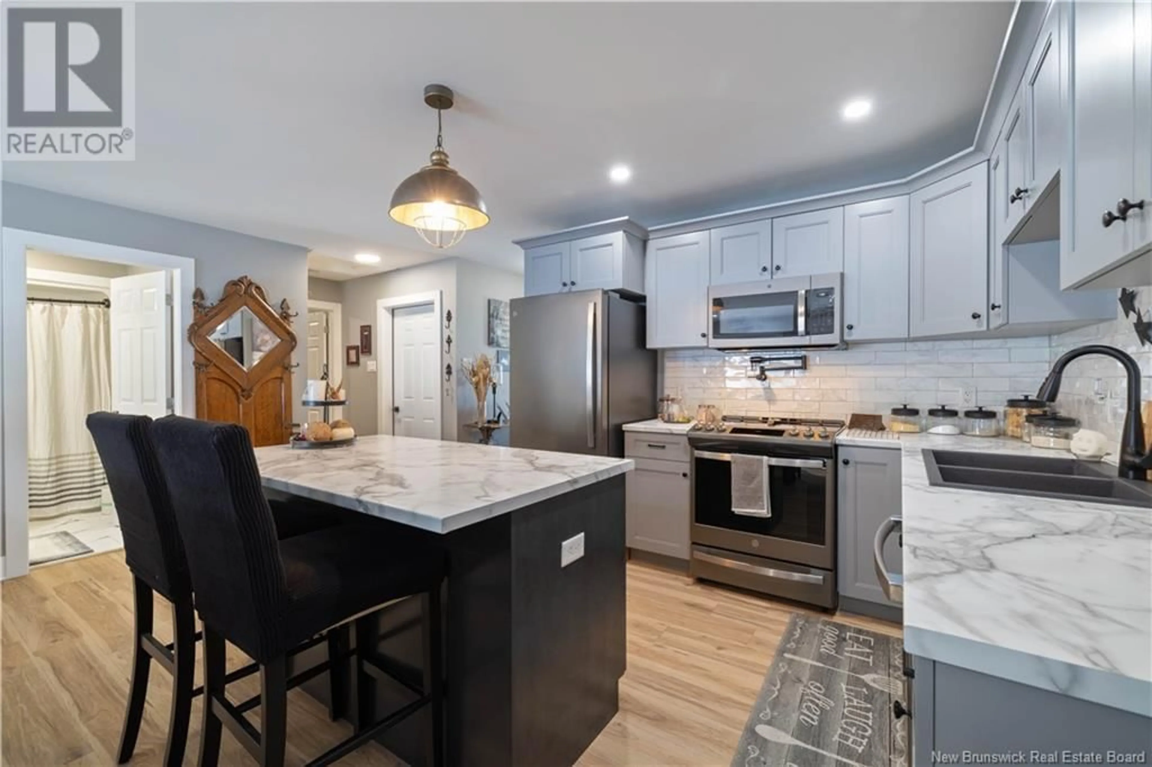 Open concept kitchen, ceramic/tile floor for 11 Sheraton Avenue, Quispamsis New Brunswick E2E1L9