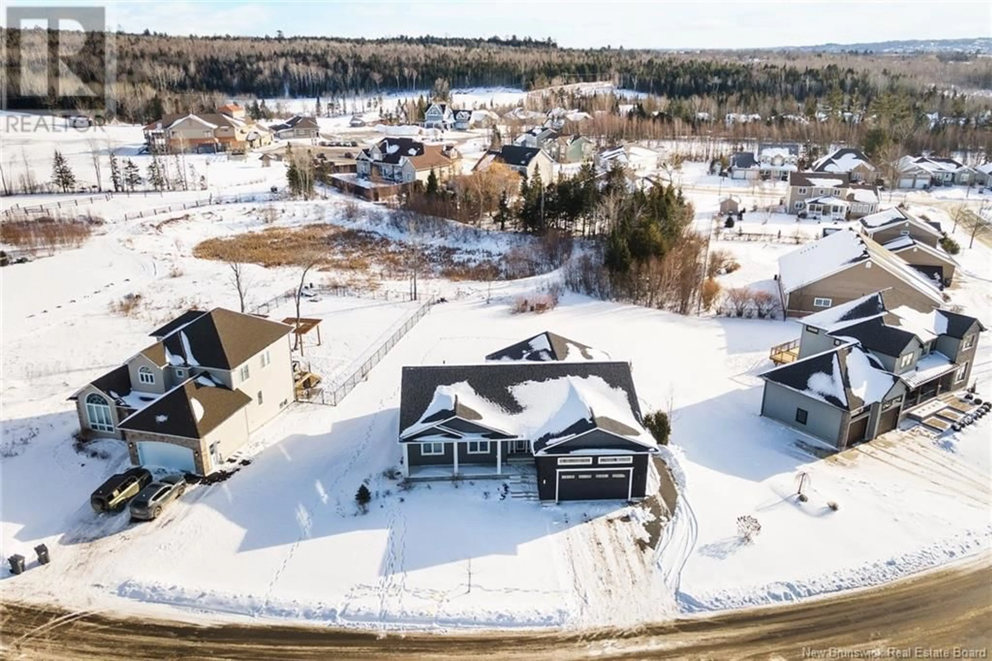 A pic from outside/outdoor area/front of a property/back of a property/a pic from drone, unknown for 38 Stonehill Lane, Fredericton New Brunswick E3G0E9