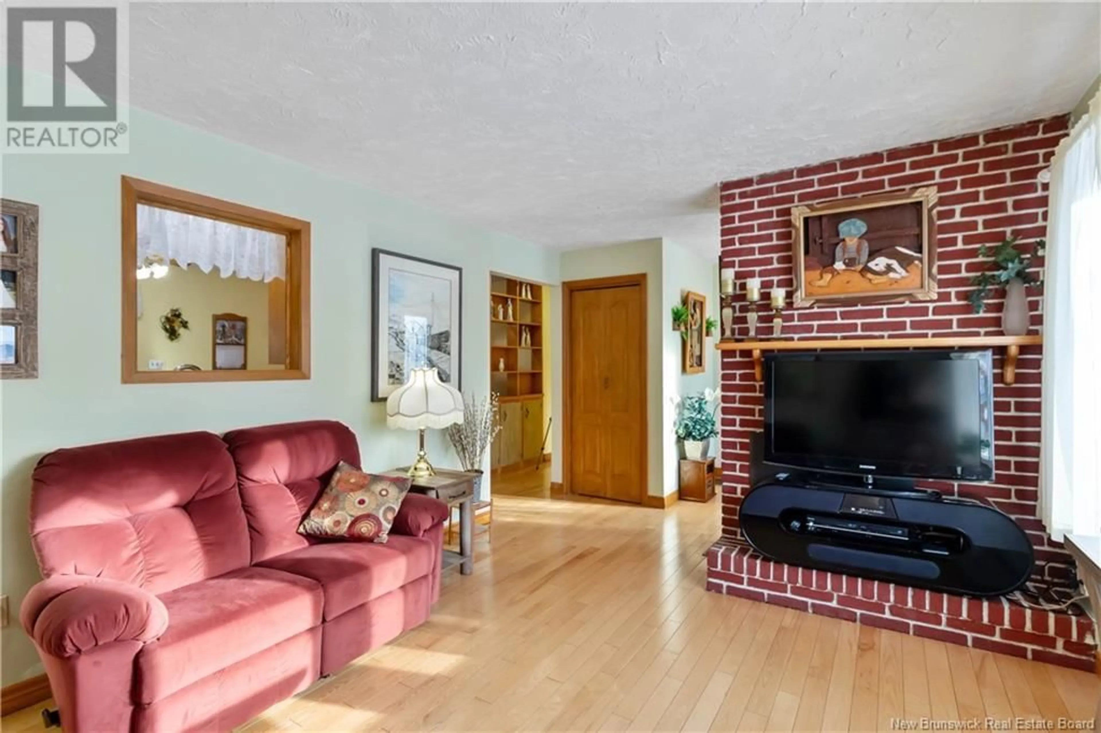 Living room with furniture, unknown for 187 Thibodeau Street, Dieppe New Brunswick E1A1V7