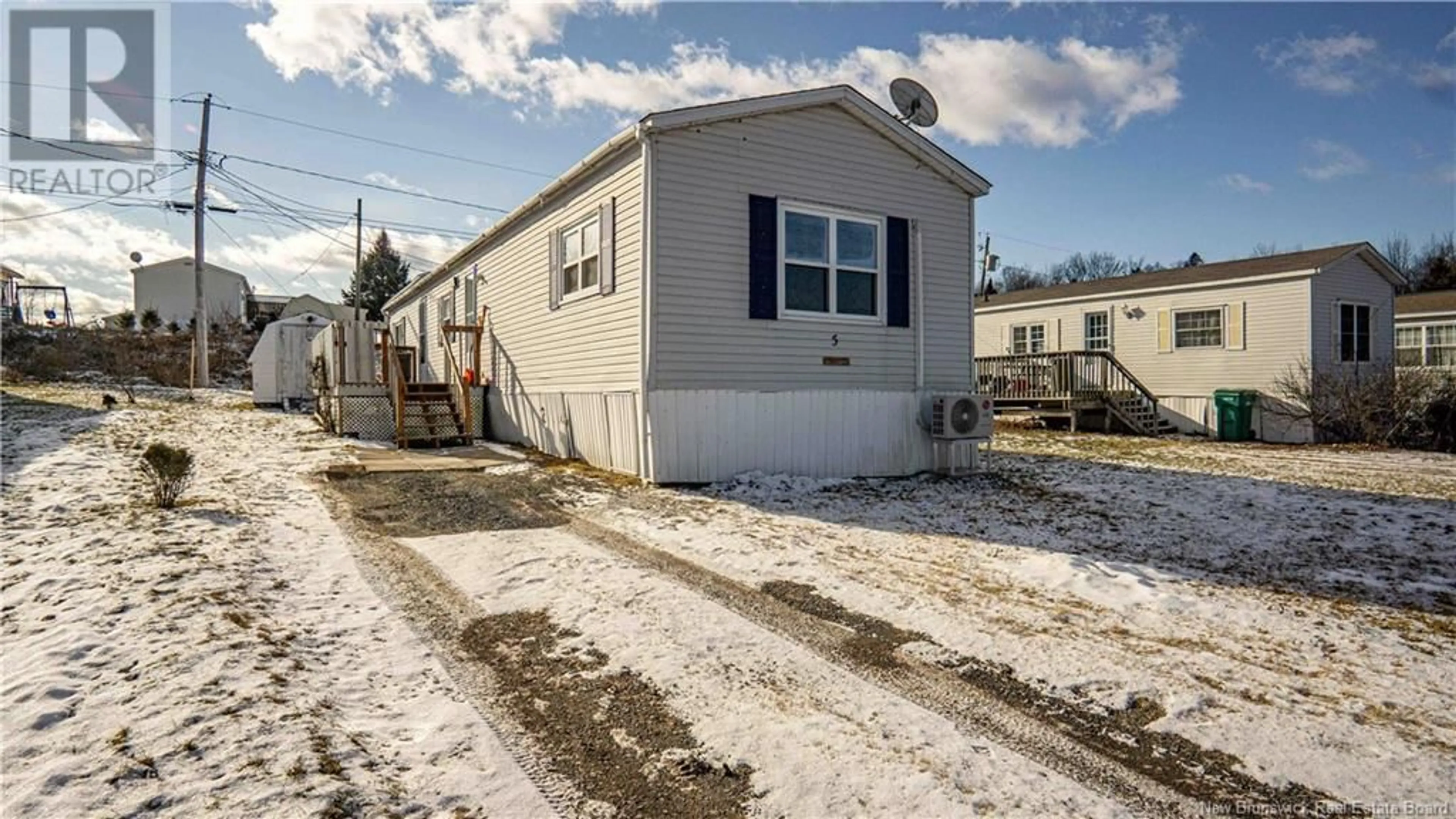 Home with vinyl exterior material, street for 5 Leslee Drive, Lincoln New Brunswick E3B6W7