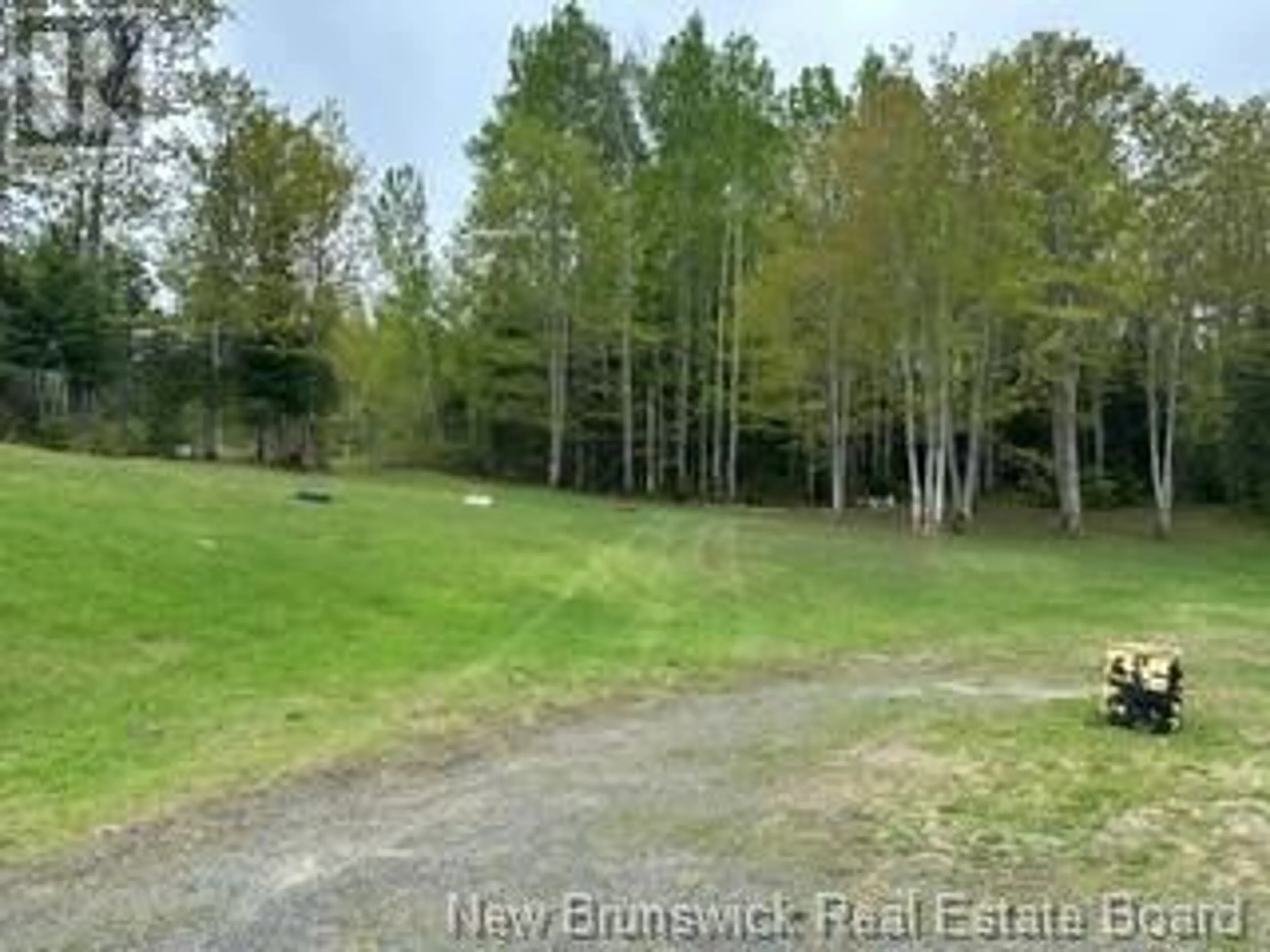 A pic from outside/outdoor area/front of a property/back of a property/a pic from drone, forest/trees view for 2790 Route 275, Balmoral New Brunswick E8E1L3